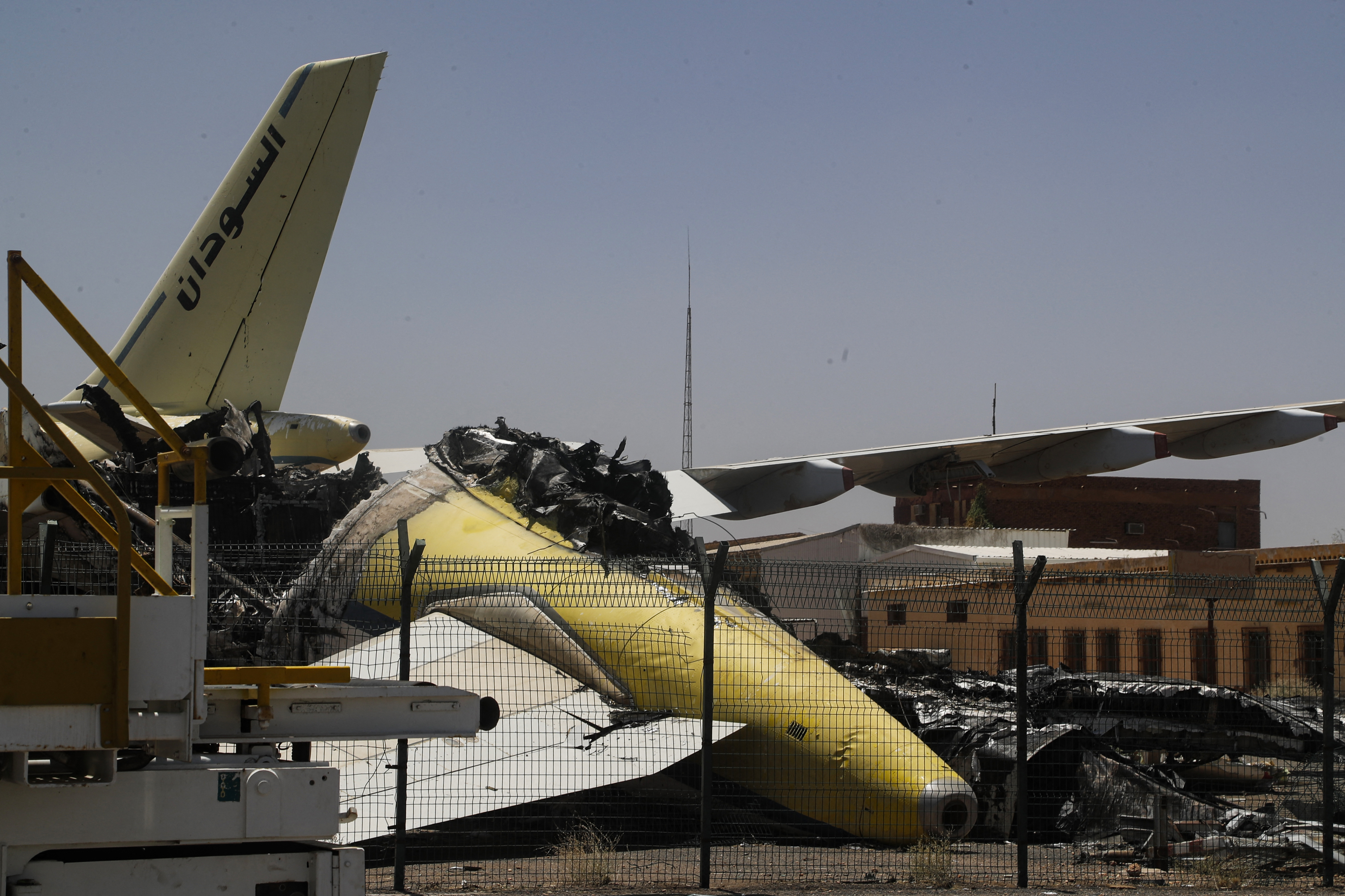CORRECTION / Heavily damaged aircraft are seen at Khartoum International Airport in Khartoum on April 28, 2026.