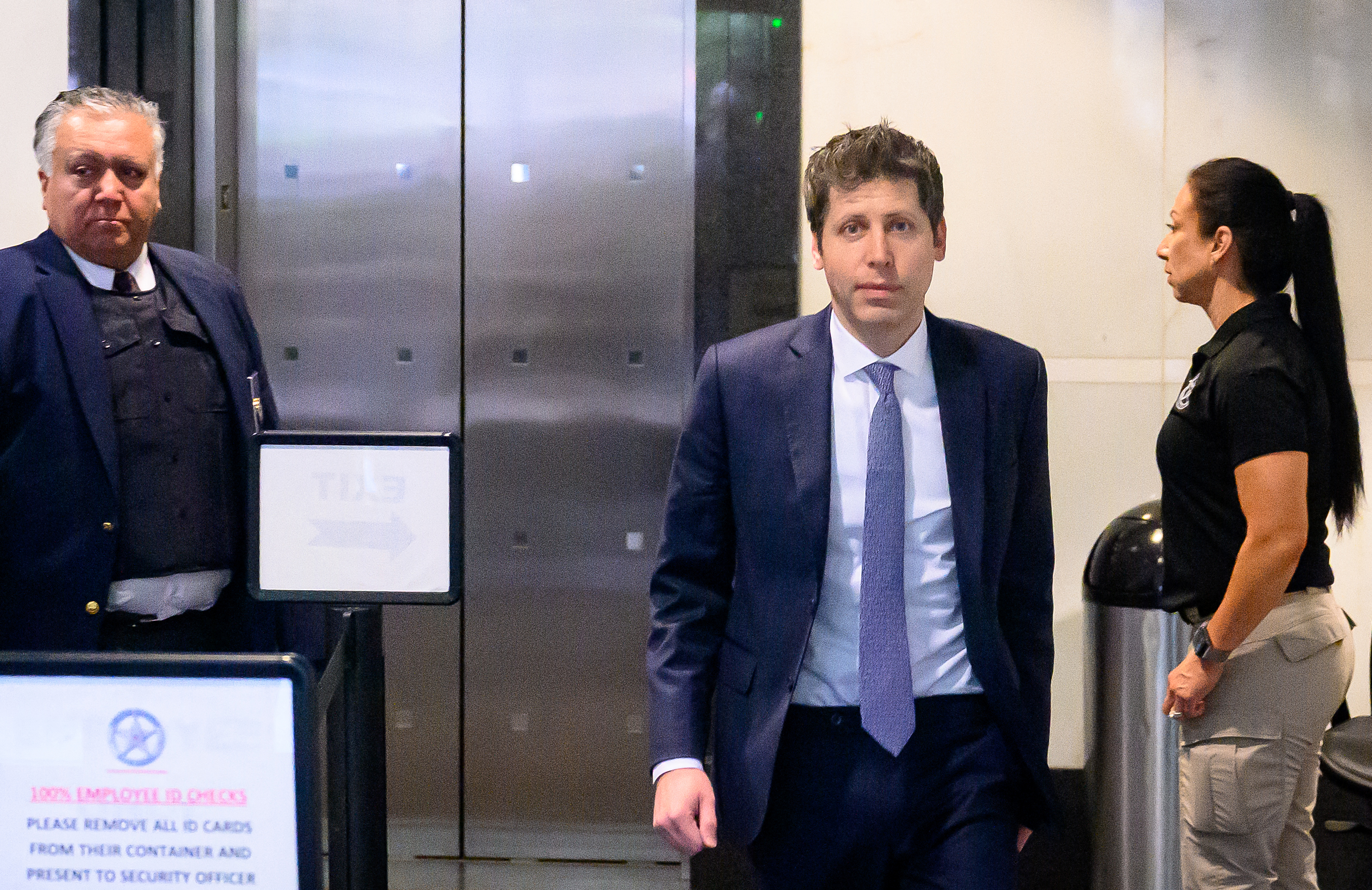 TOPSHOT - OpenAI CEO Sam Altman arrives at the federal courthouse during proceedings in the trial over Elon Musk's lawsuit against OpenAI in Oakland, California, on May 12, 2026.
