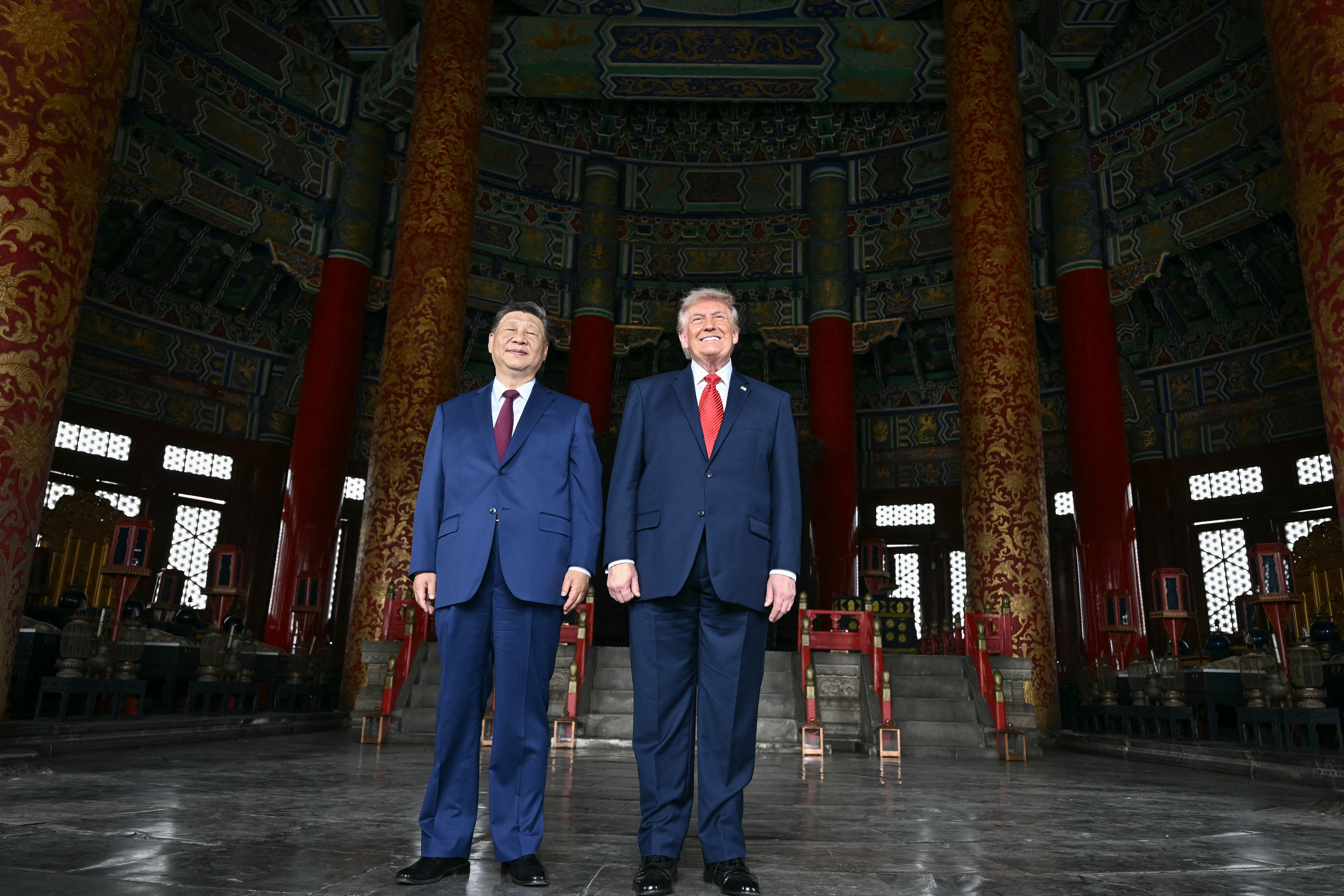 China's President Xi Jinping (L) and US President Donald Trump visit the Temple of Heaven in Beijing on May 14, 2026.
