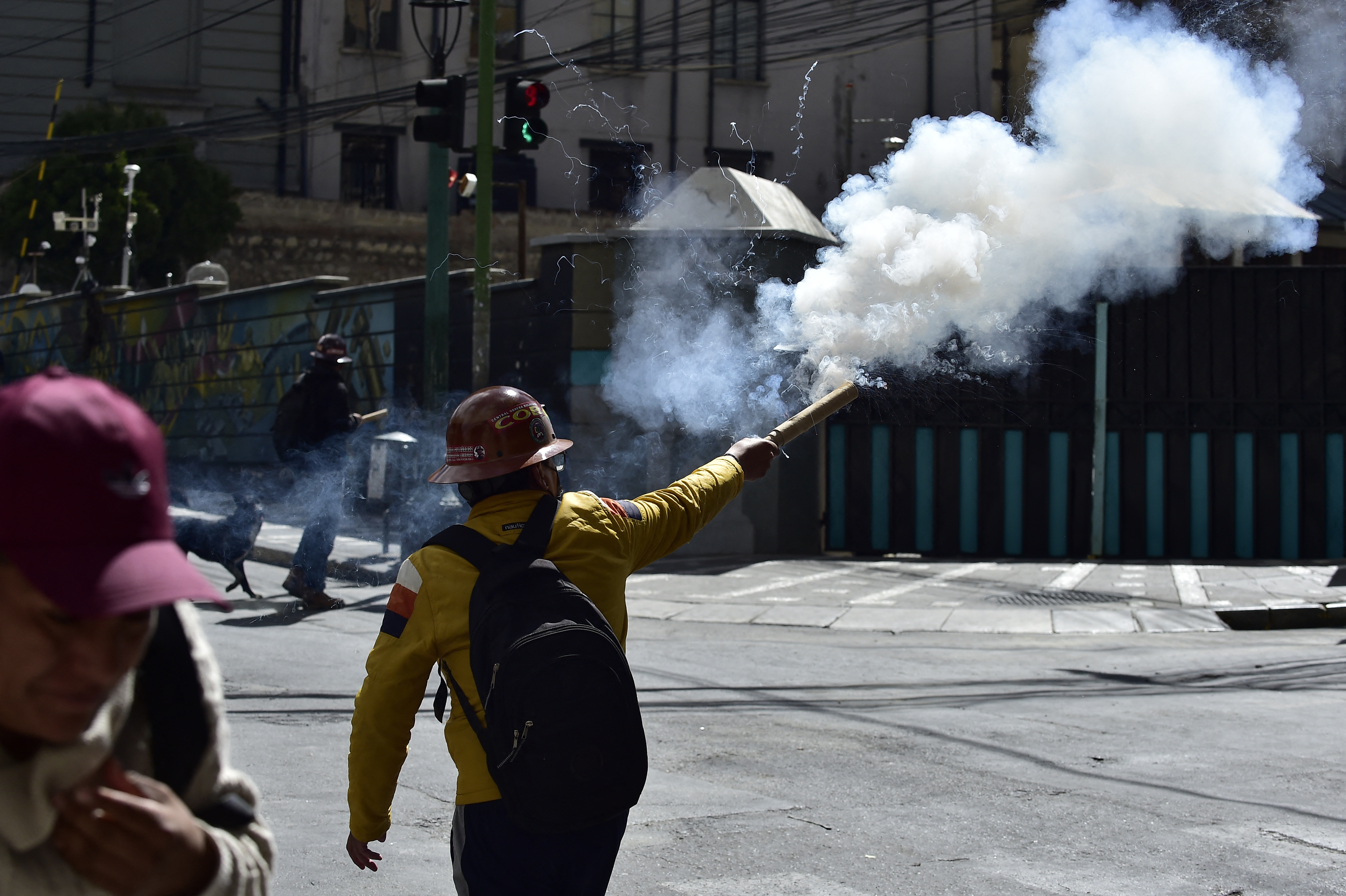 Miners clash with riot police during a protest demanding the resignation of Bolivian President Rodrigo Paz, in La Paz, on May 18, 2026.