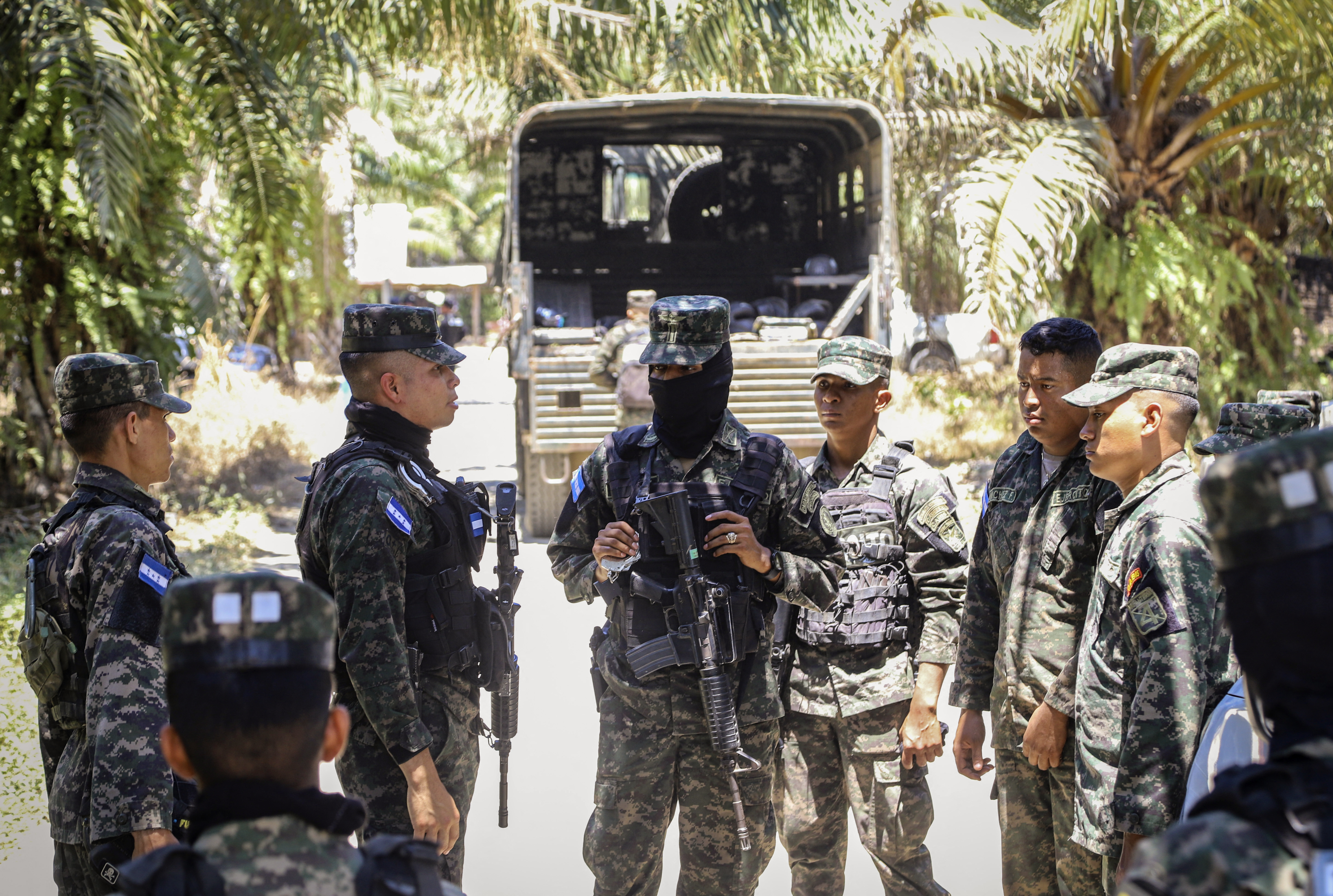 Army soldiers prepare to patrol near the site of a massacre in Trujillo, Honduras on May 21, 2026.