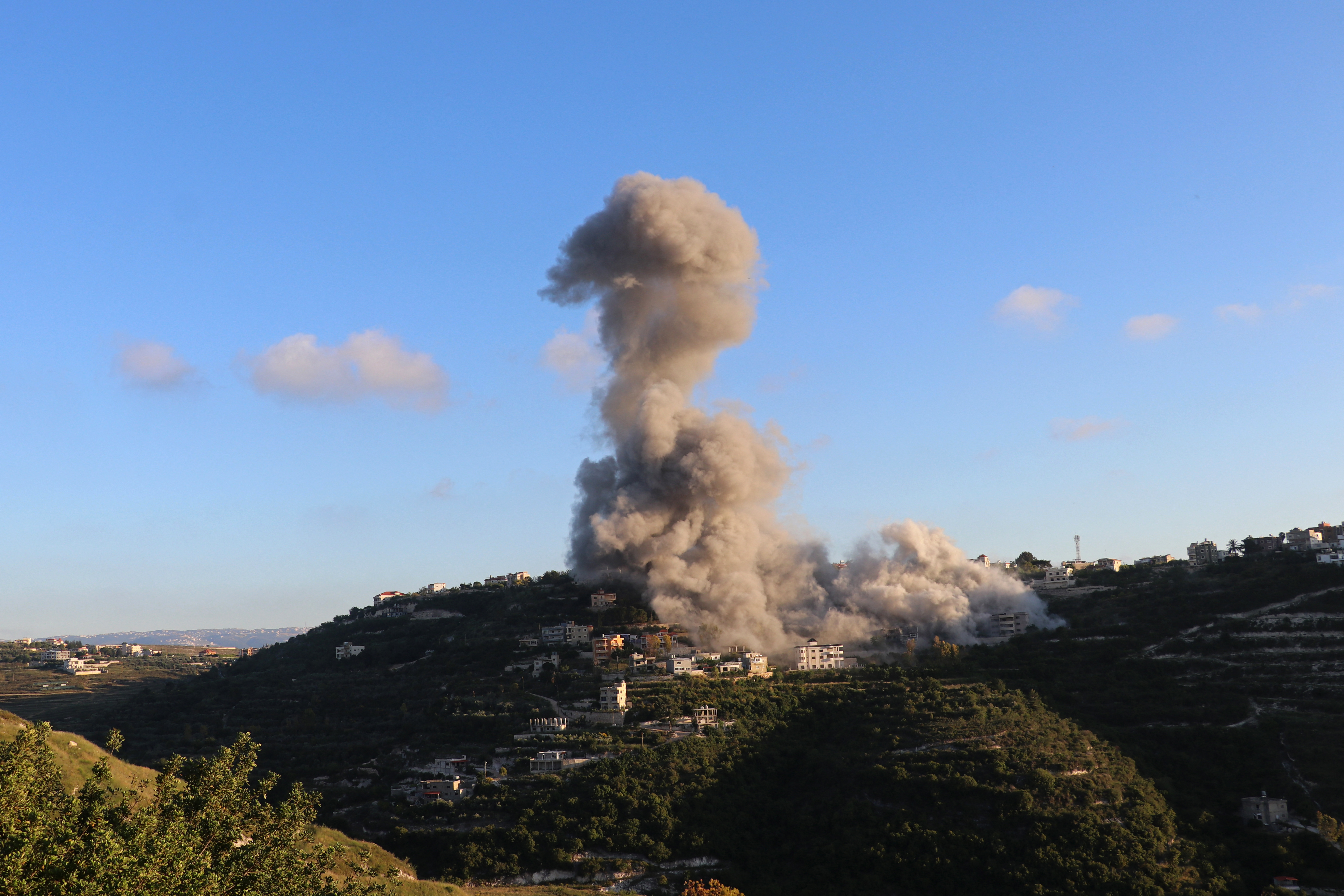 Smoke rises following an Israeli strike on the southern Lebanese village of Deir Qanoun an-Naher on May 24, 2026.
