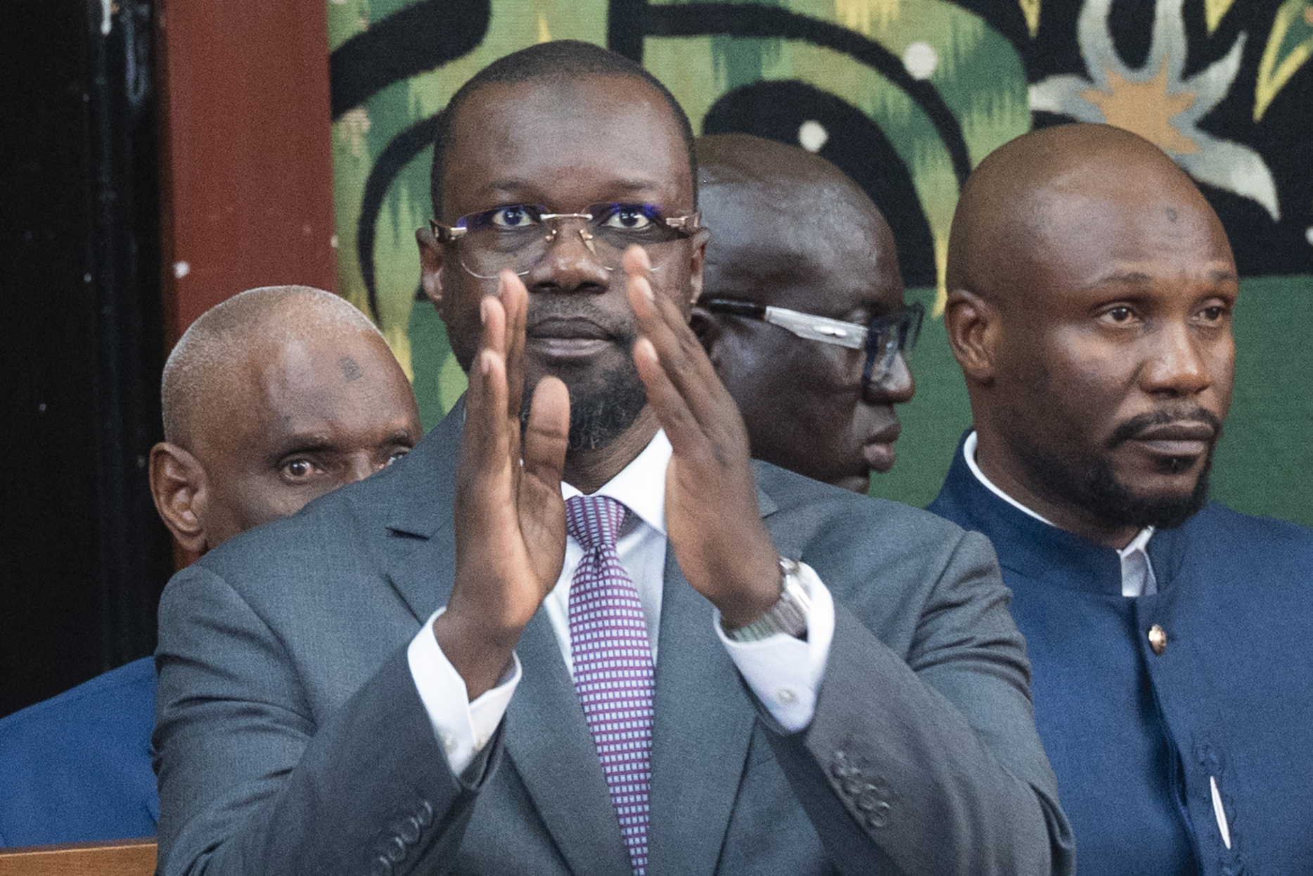 Former Senegal Prime Minister Ousmane Sonko (C) acknowledges his supporters as he becomes the new speaker of Senegal's National Assembly on May 26, 2026, at the National Assembly in Dakar [AFP]