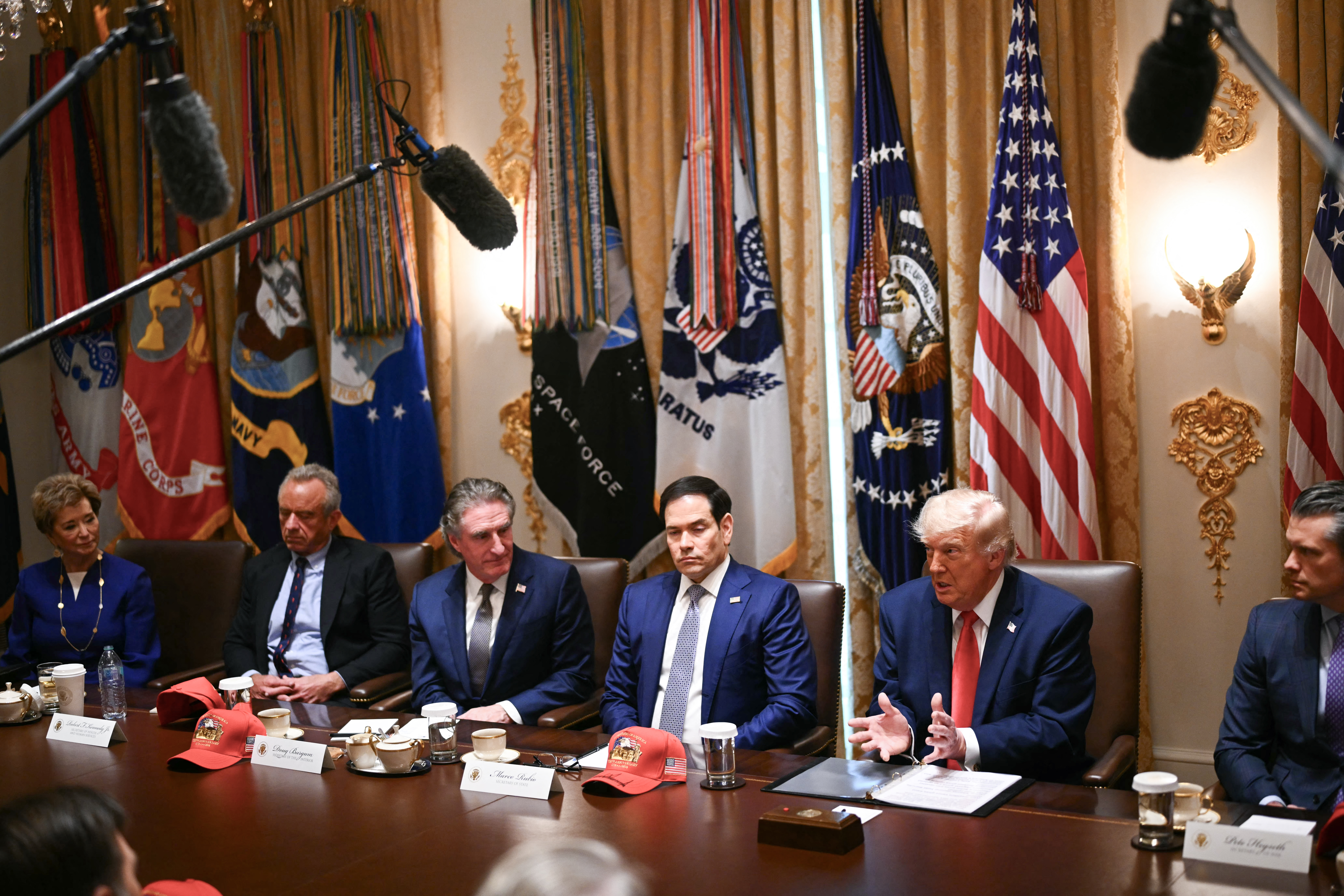 US President Donald Trump speaks during a meeting.