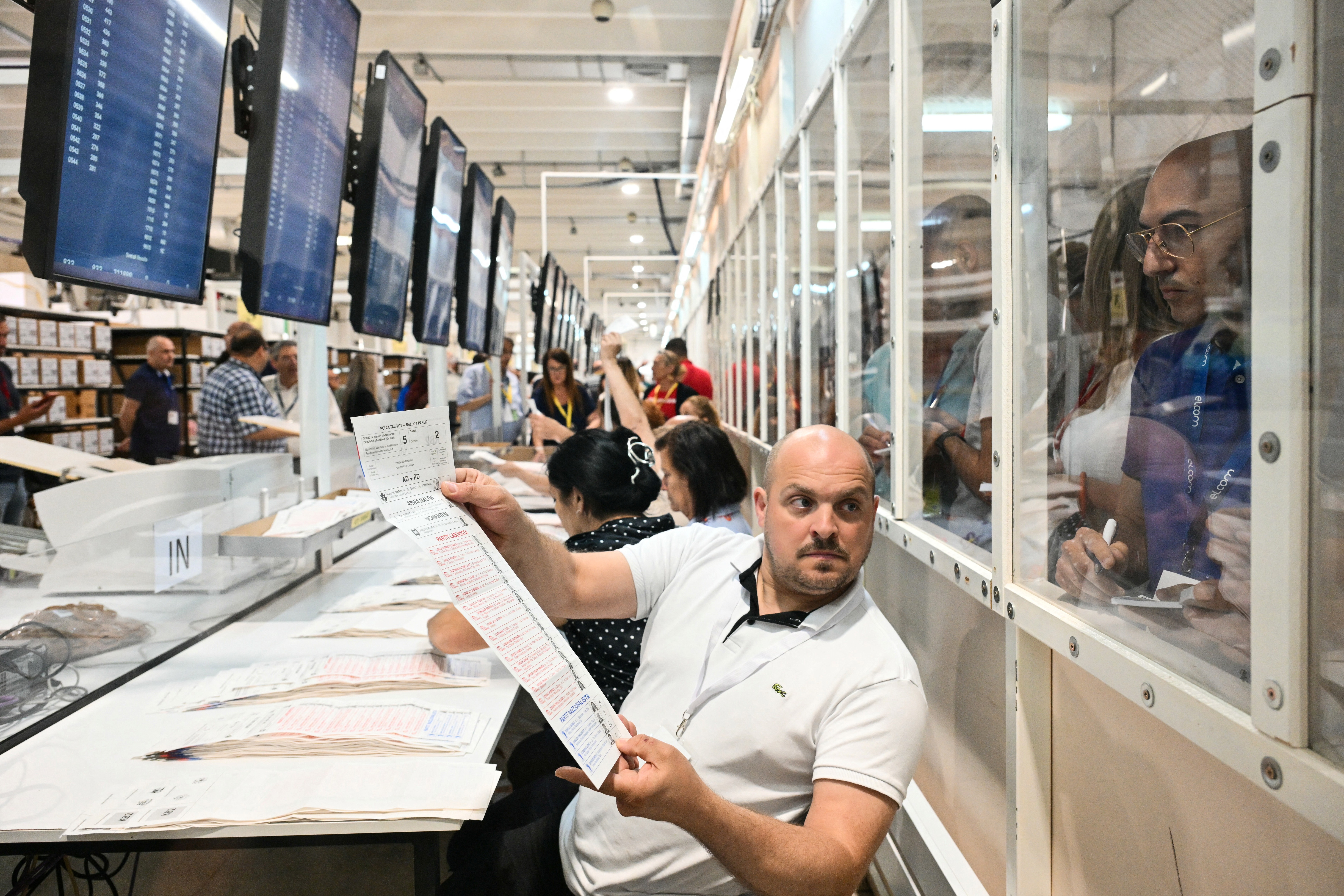 Members of staff count votes casted for Malta's legislative elections at the Electoral Commission Counting Complex, in Naxxar, on the island of Malta, on May 31, 2026.