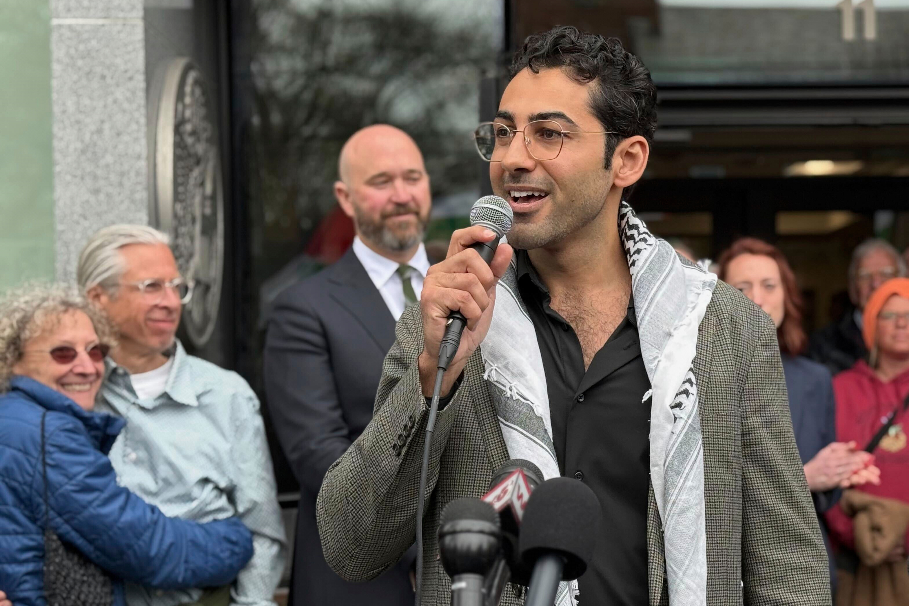 Mohsen Mahdawi speaks outside the courthouse after a judge released the Palestinian student activist on April 30, 2025