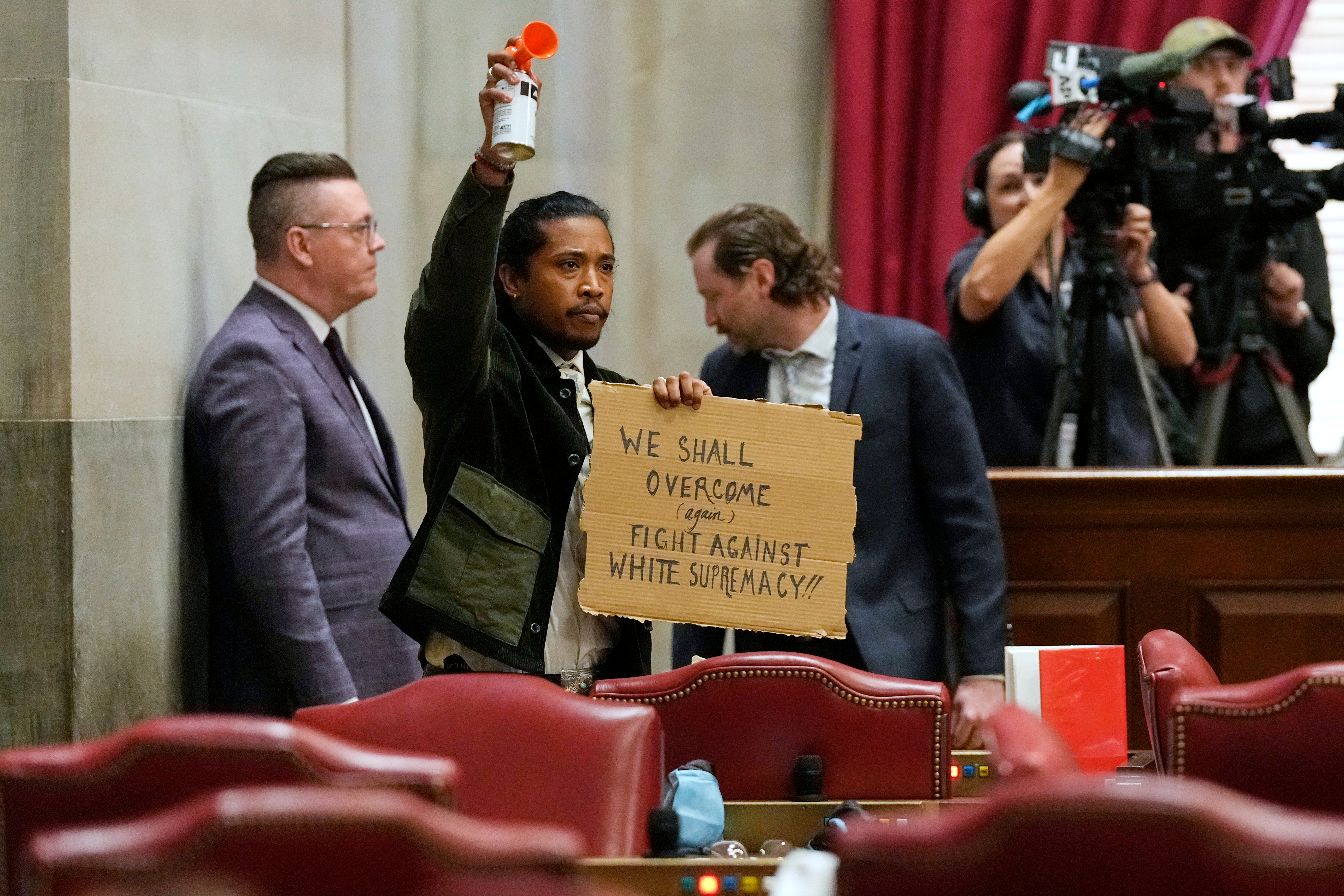 Rep. Justin Jones, D-Nashville, blows an air horn on the House floor during a special session of the state legislature to redraw U.S. Congressional voting maps Thursday, May 7, 2026, in Nashville, Tenn. (AP Photo/George Walker IV)