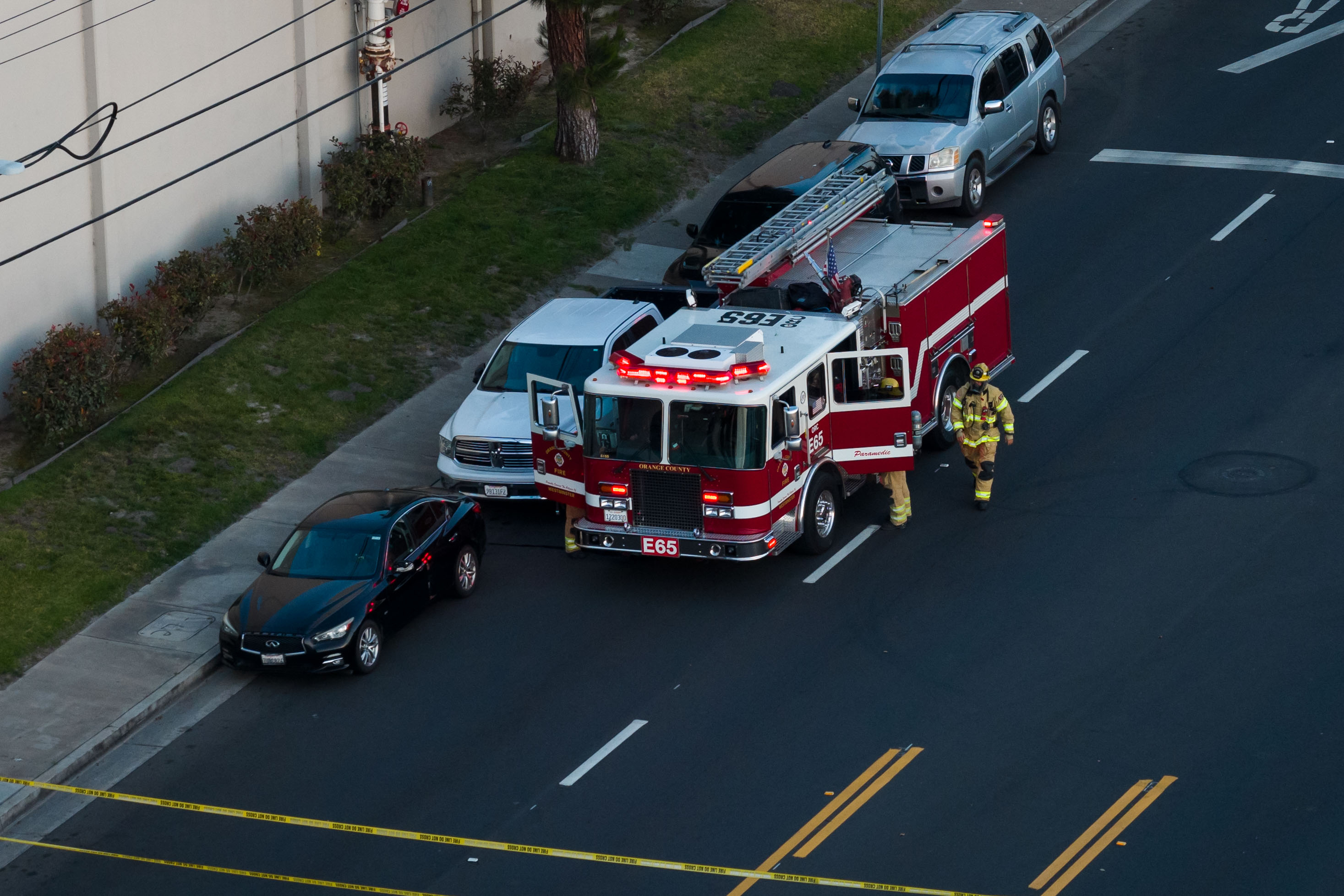 Firefighters work at the scene of a chemical tank that overheated at an aerospace plant in Garden Grove, California