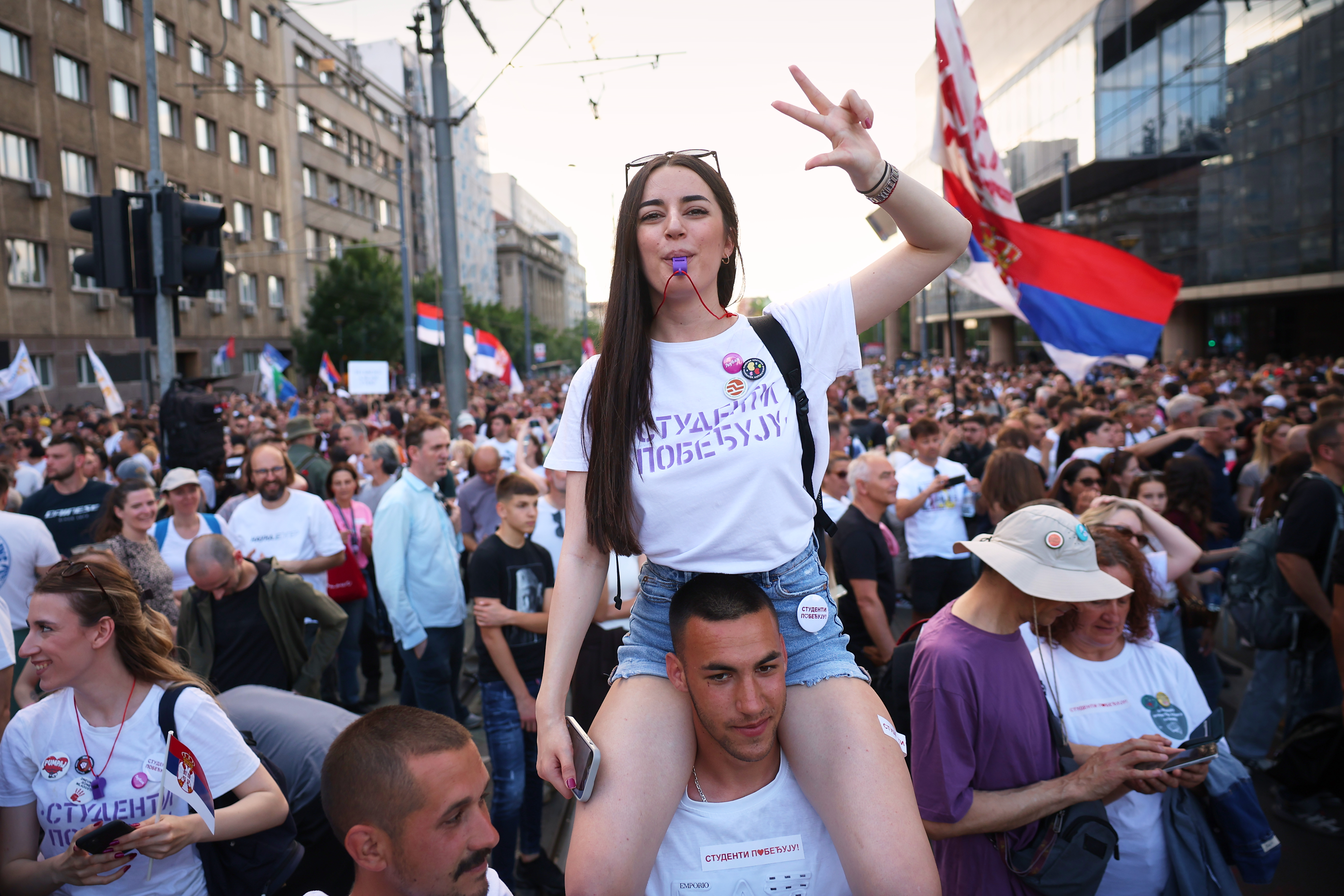 Anti-government protesters take part in a rally led by Serbia's protesting university students who are pushing for major political changes in the Balkan country run by President Aleksandar Vucic, in Belgrade, Serbia, Saturday, May. 23, 2026. (AP Photo/Armin Durgut)