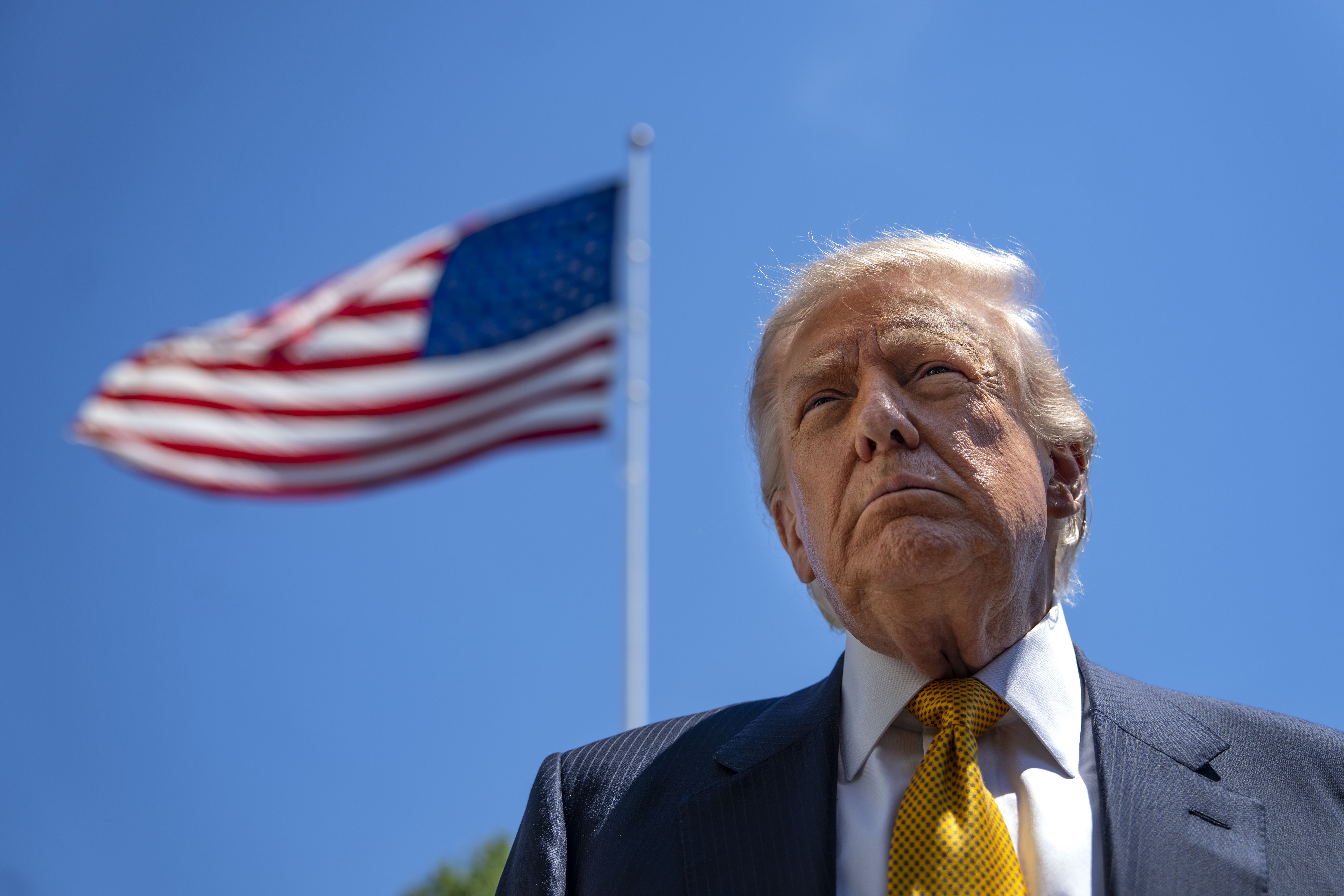 epa12951614 US President Donald Trump speaks to the press before departing the White House for China, in Washington, DC, USA, 12 May 2026. President Trump is leaving the US to visit China where he will meet with President Xi in Beijing. EPA/BONNIE CASH / POOL