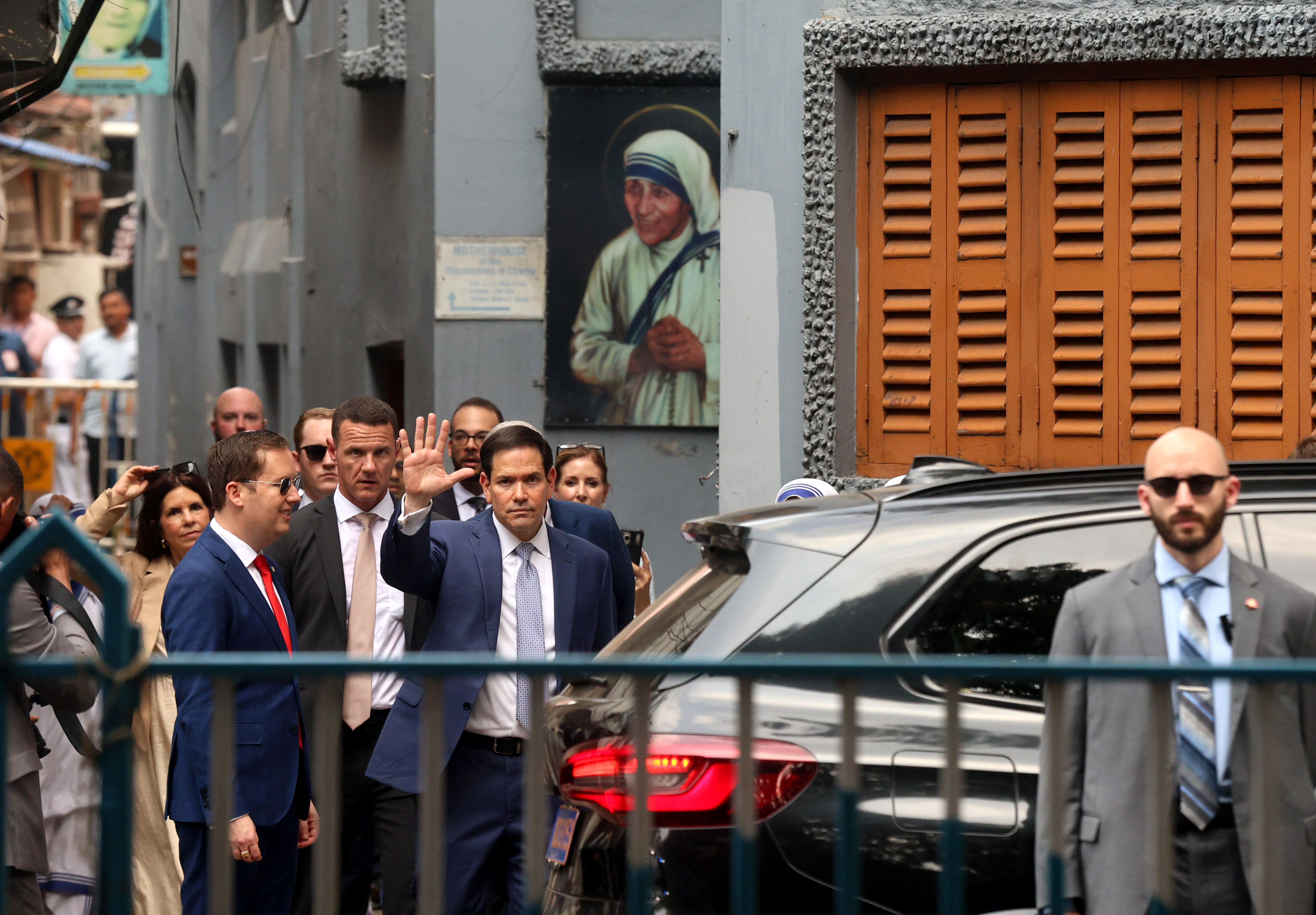 epaselect epa12985886 US Secretary of State Marco Rubio waves to the media near Mother House in Kolkata, India, 23 May 2026. Rubio arrived in Kolkata on the opening leg of a four-day official visit to India, where he will tour several cities and attend the Quadrilateral Security Dialogue (Quad) Foreign Ministers' meeting in New Delhi. EPA/PIYAL ADHIKARY