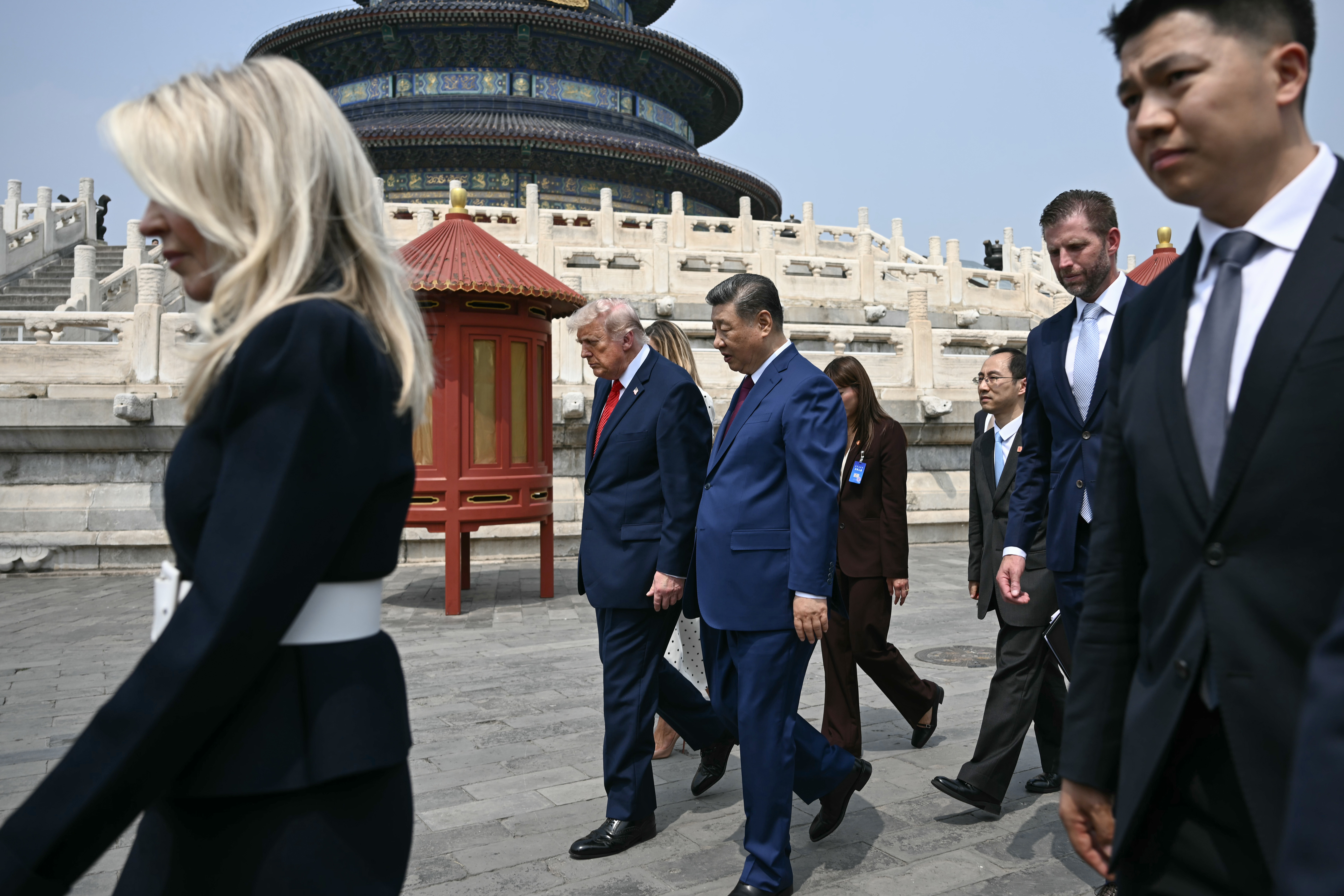 BEIJING, CHINA - MAY 14: China's President Xi Jinping (C), US President Donald Trump (Center L) and Eric Trump (2nd R) visit the Temple of Heaven on May 14, 2026 in Beijing, China. Xi warned Trump that the issue of Taiwan could push their two countries into "conflict" if mishandled, a stark opening salvo as a superpower summit set to tackle numerous thorny issues began in Beijing on May 14. (Photo by Brendan Smialowski - Pool/Getty Images)
