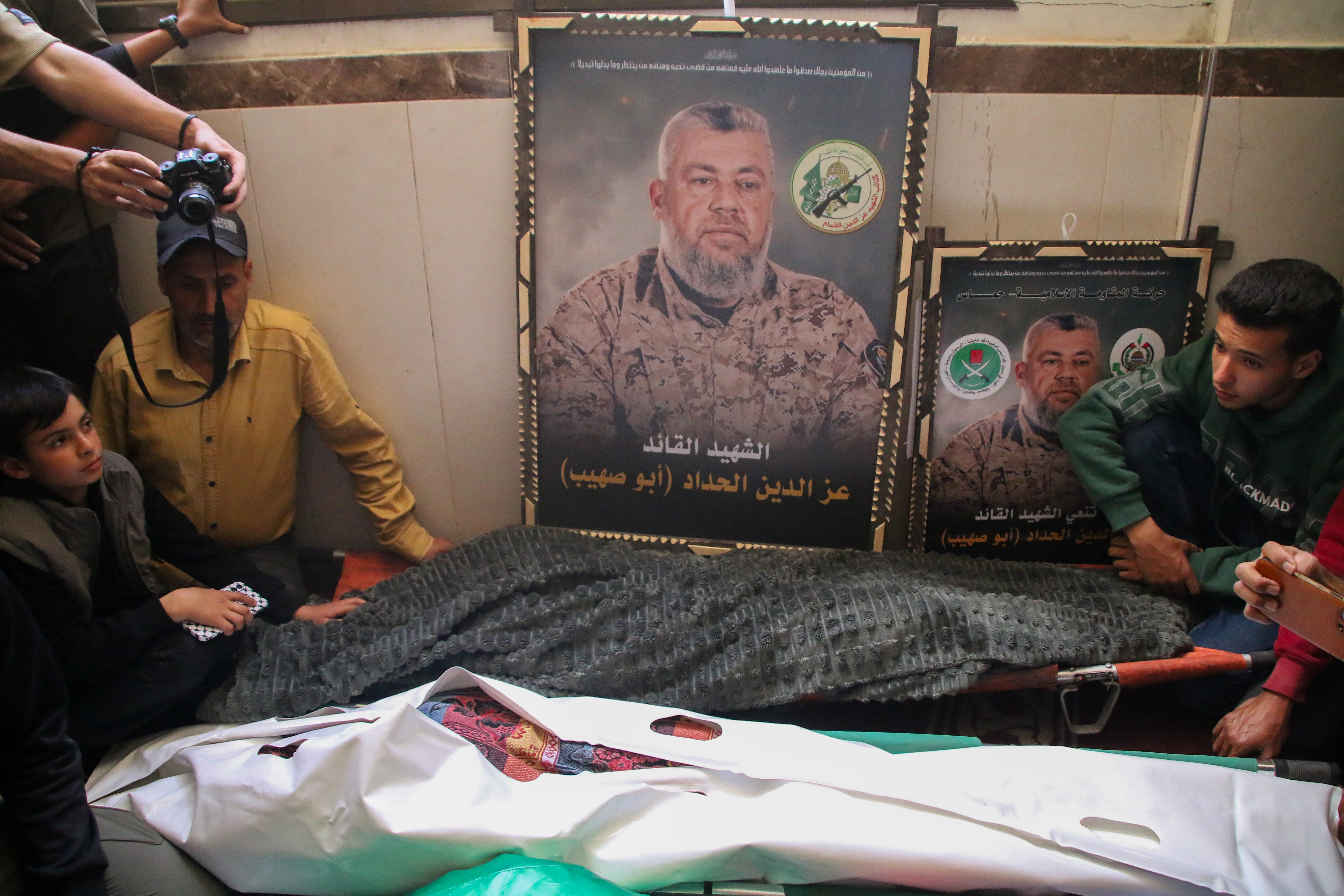 GAZA CITY, GAZA - MAY 16: (EDITOR'S NOTE: Image depicts death) A funeral is held for Izz ad-Din al-Haddad, commandeer of Hamas's military wing, and his wife and daughter on May 16, 2026 at the Al-Aqsa Martyrs Mosque in Gaza City, Gaza. The three were killed last night in an Israeli air strike on their vehicle as it drove away from a residential building that was also targeted. (Photo by Ahmad Hasaballah/Getty Images)