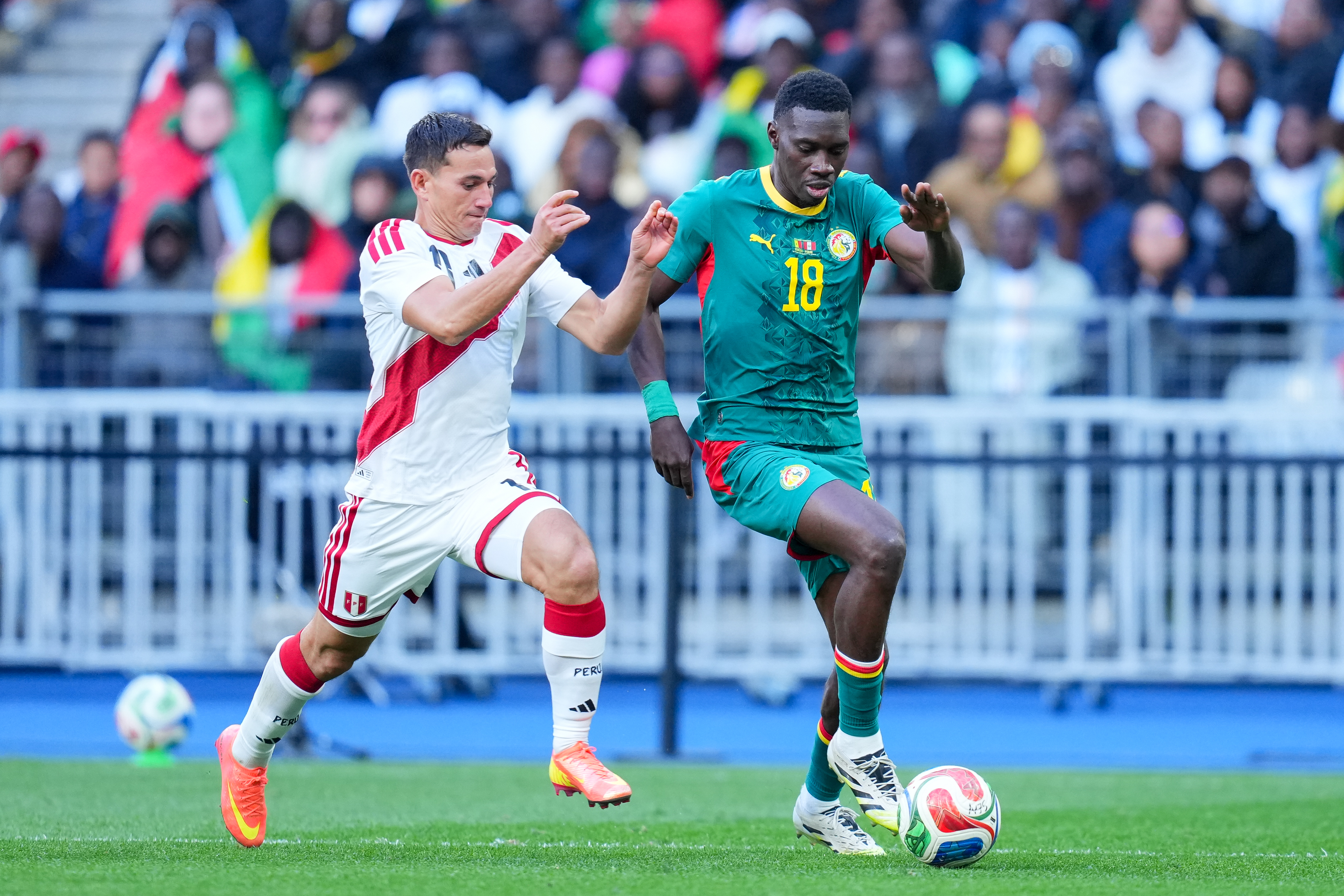 PARIS, FRANCE - MARCH 28: Ismaila Sarr of Senegal runs with the ball during the international friendly match between Senegal and Peru at Stade de France on March 28, 2026 in Paris, France. (Photo by Franco Arland/Getty Images)