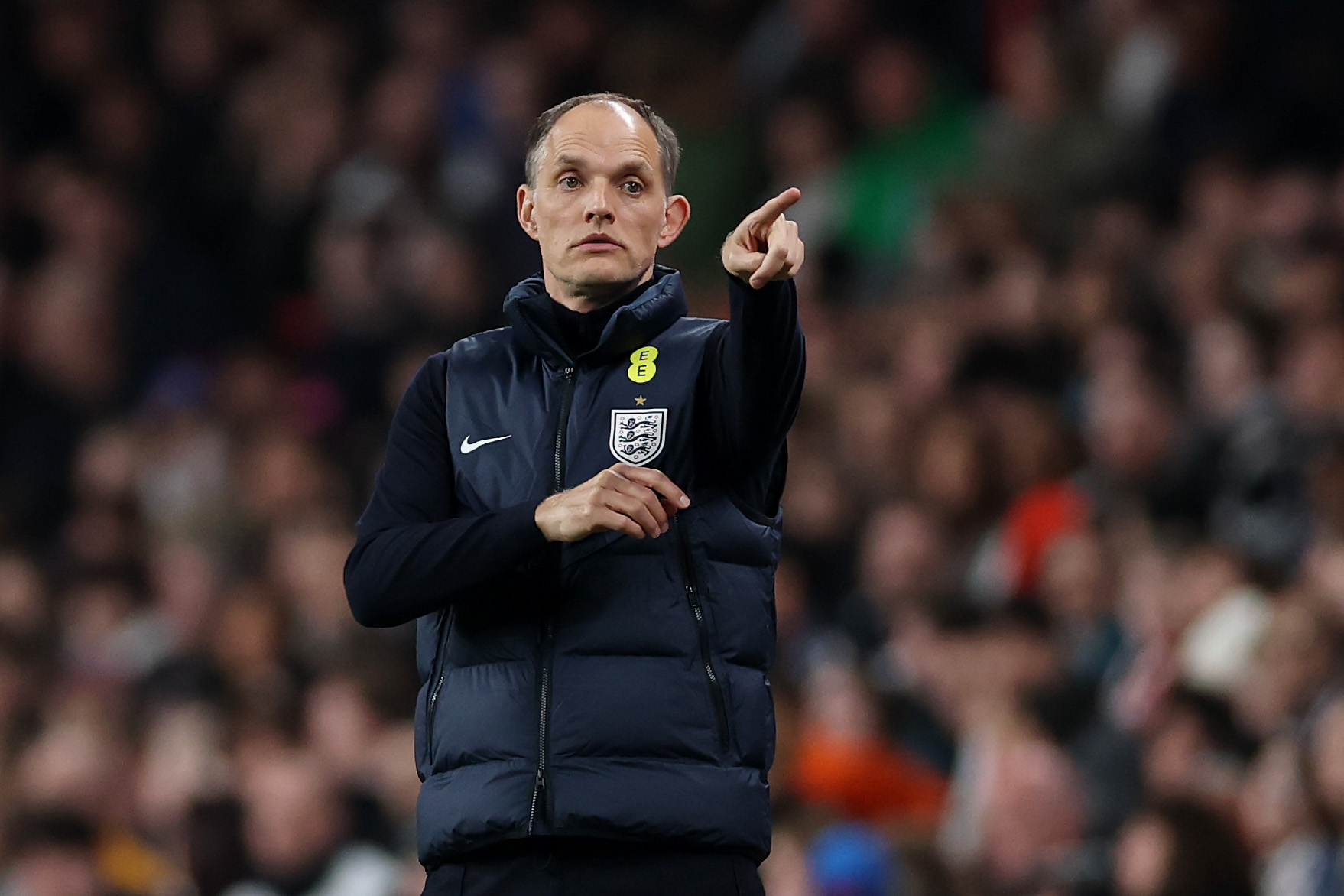 Thomas Tuchel, head coach of England, reacts on the sidelines of a match.