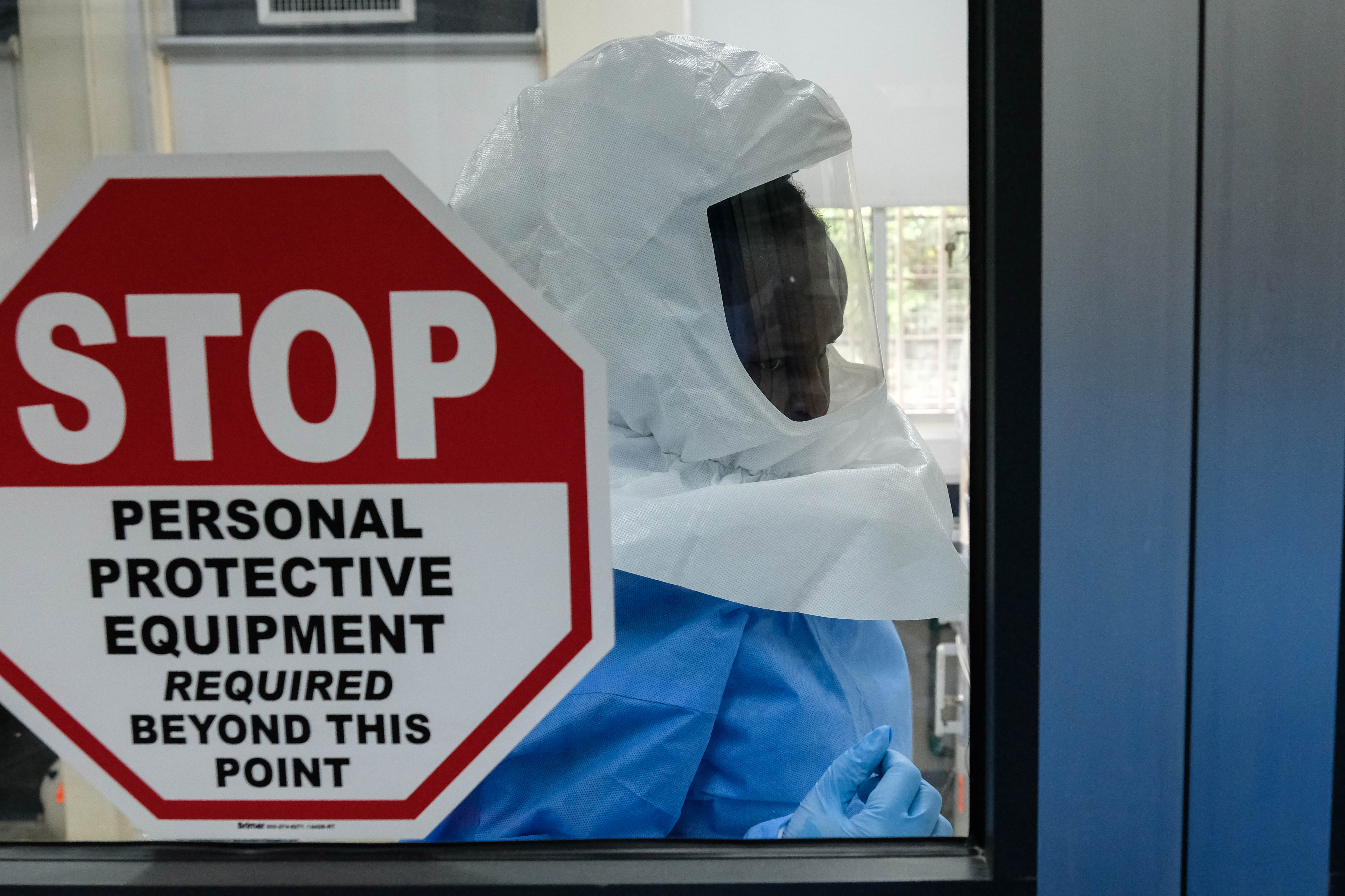 ENTEBBE, UGANDA - MAY 26: Sophia Mulei, Laboratory Technologist inside the Viral Hemorrhagic Fever Laboratory at Uganda Virus Research Institute on May 26, 2026 in Entebbe, Uganda. The Uganda Research Institute is the primary institution carrying out research and laboratory testing of Ebola samples, as health officials in the East African country scramble to contain the outbreak, which has spilled over from the epicenter in neighboring Democratic Republic of Congo (DRC). On Monday authorities reported that the total number of confirmed infections in Uganda has risen to seven, while the number of suspected cases in the DRC has reached 904, with 119 suspected deaths. (Photo by Hajarah Nalwadda/Getty Images)