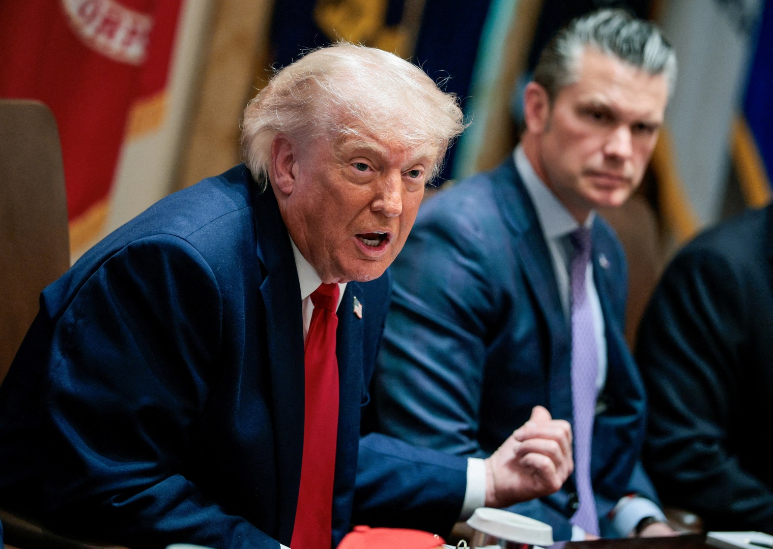 US President Donald Trump speaks next to Defense Secretary Pete Hegseth during a cabinet meeting in the Cabinet Room at the White House, in Washington, DC, US on May 27, 2026. [Evan Vucci/Reuters]