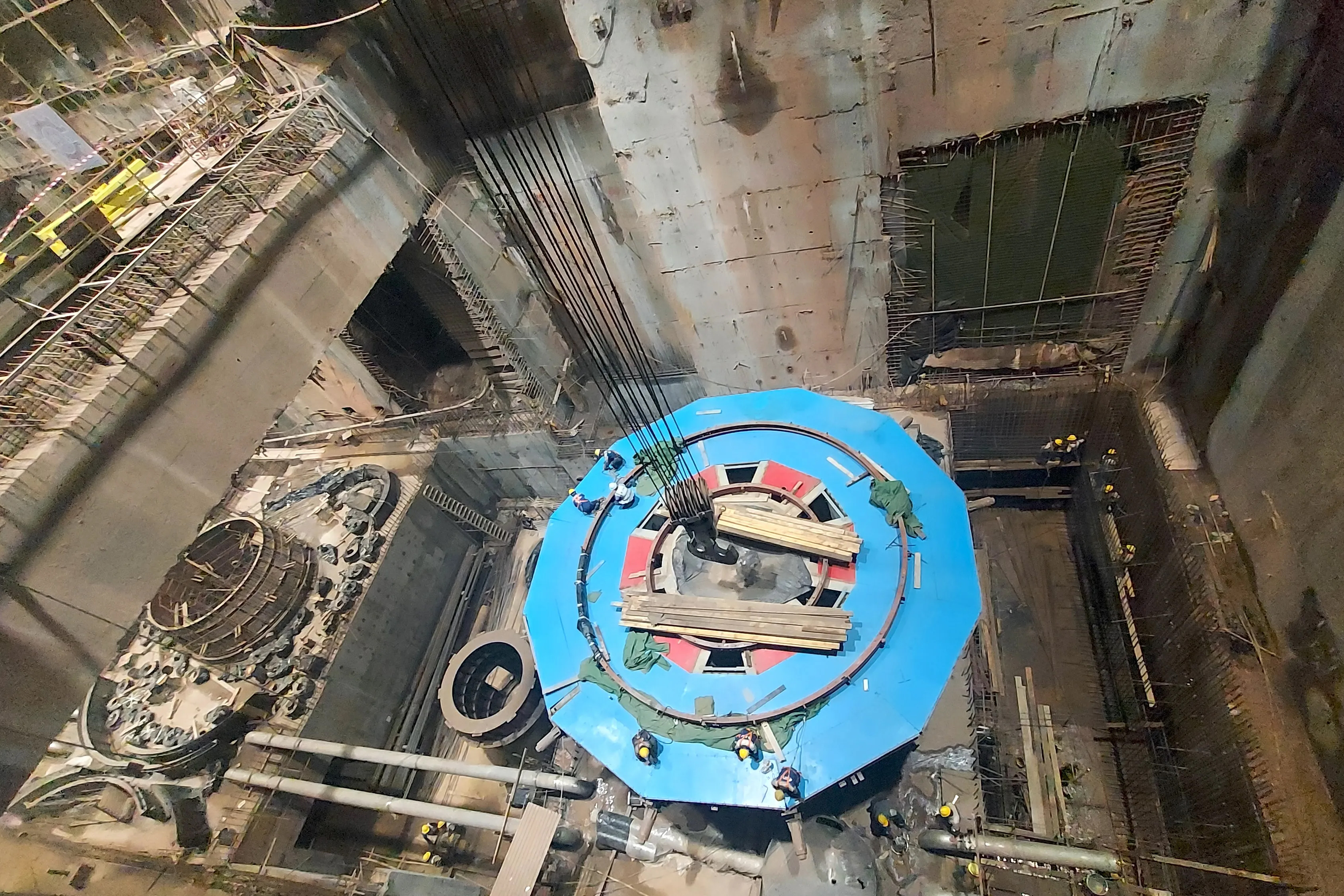The Rogun dam project features massive turbines that spin under immense pressure, then convert the movement of water into electricity [Al Jazeera]