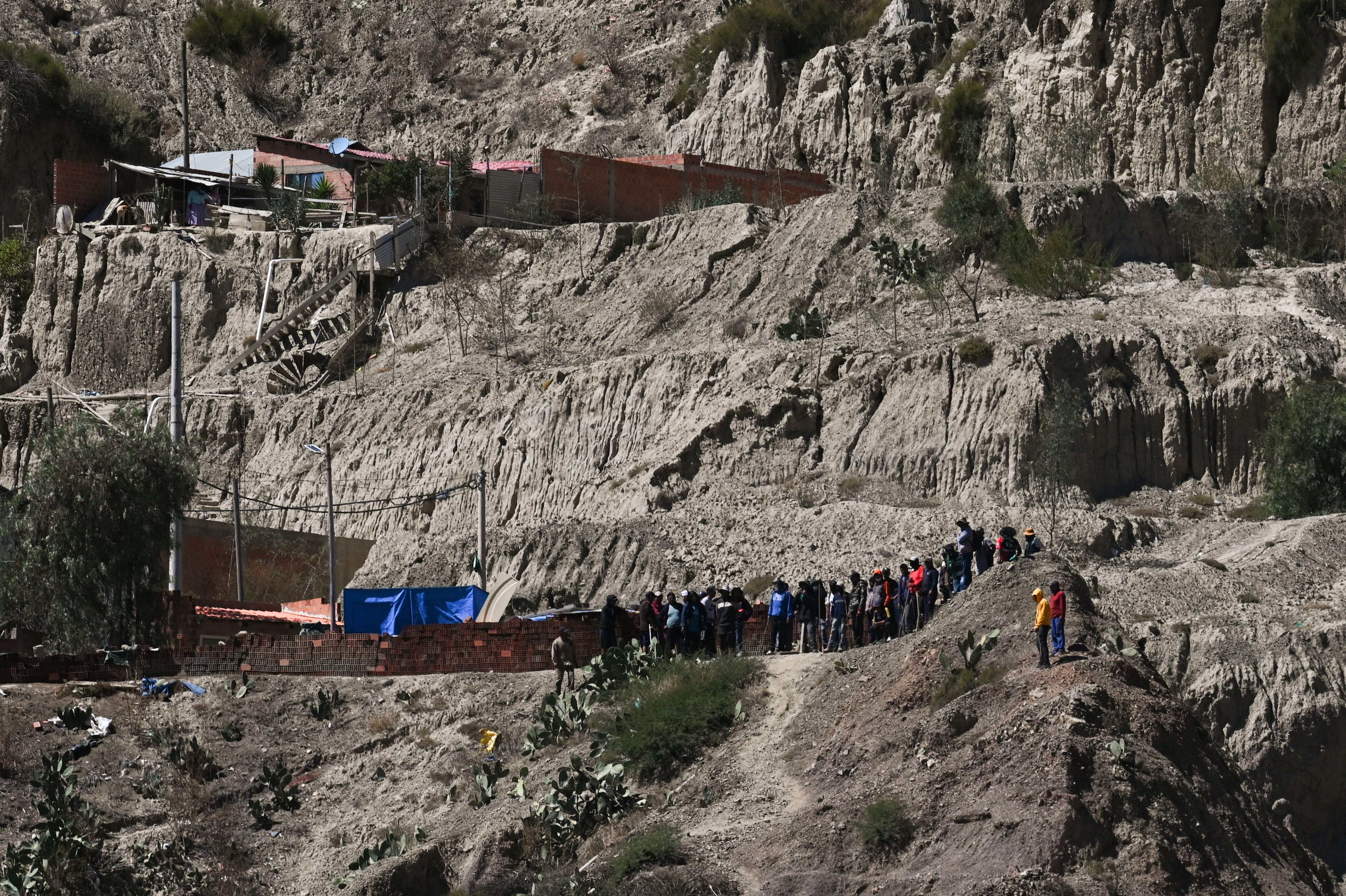 People gather during protests against President Rodrigo Paz's government amid an ongoing economic and fuel crisis, in Lipari, Bolivia, May 16, 2026. REUTERS/Claudia Morales