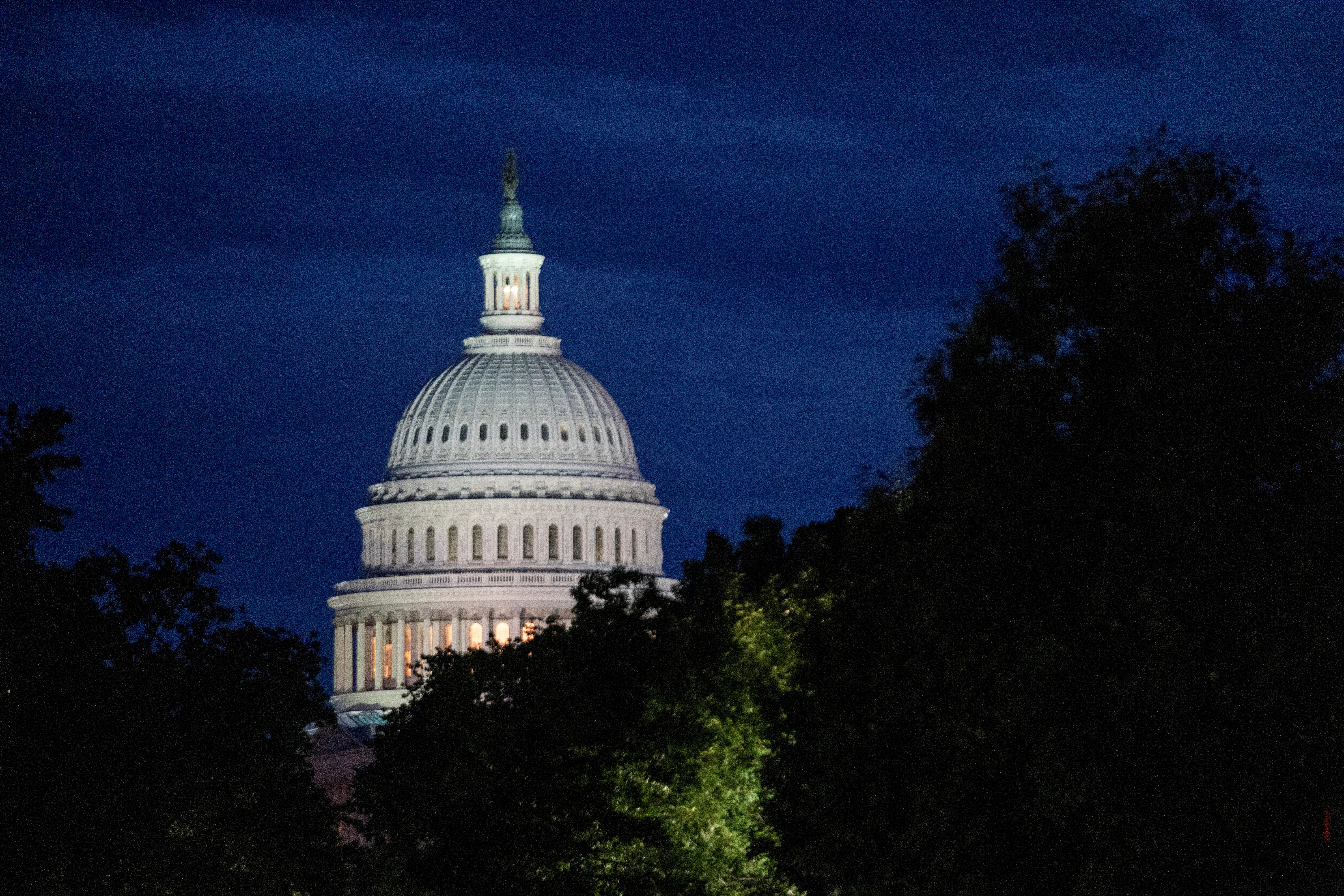 FILE PHOTO: A general view of the U.S. Capitol after United States Vice President Kamala Harris, voted on the Senate floor to break the 50-50 tie to proceed to the Inflation Reduction Act on Capitol Hill in Washington, D.C., U.S. August 6, 2022. REUTERS/Ken Cedeno/File Photo