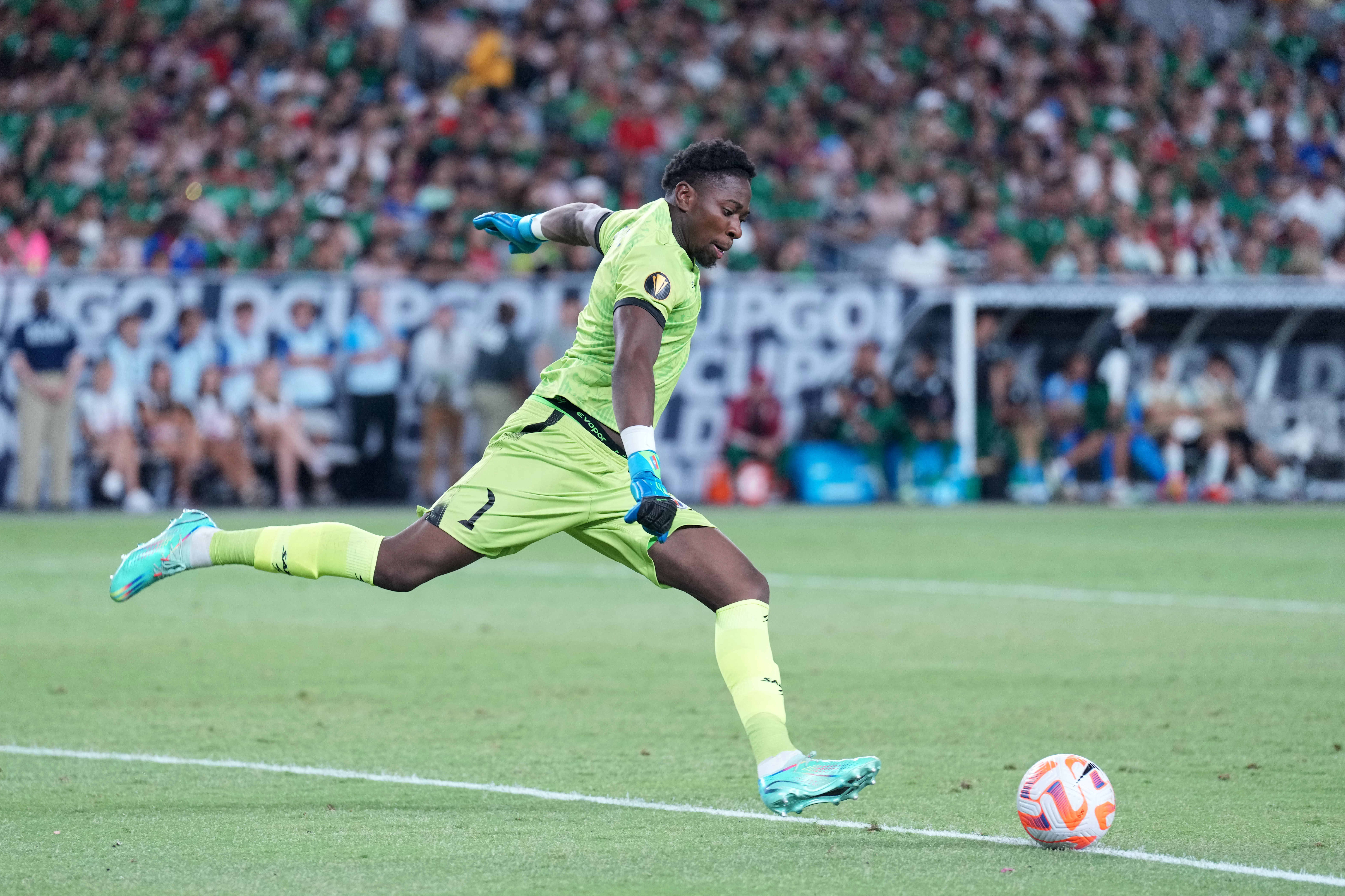 Jun 29, 2023; Glendale, Arizona, USA; (Editors Notes: Caption Correction) Haiti goalkeeper Alexandre Pierre (1) takes a goal kick against Mexico during the second half of a Gold Cup game at State Farm Stadium. Mandatory Credit: Joe Camporeale-Imagn Images