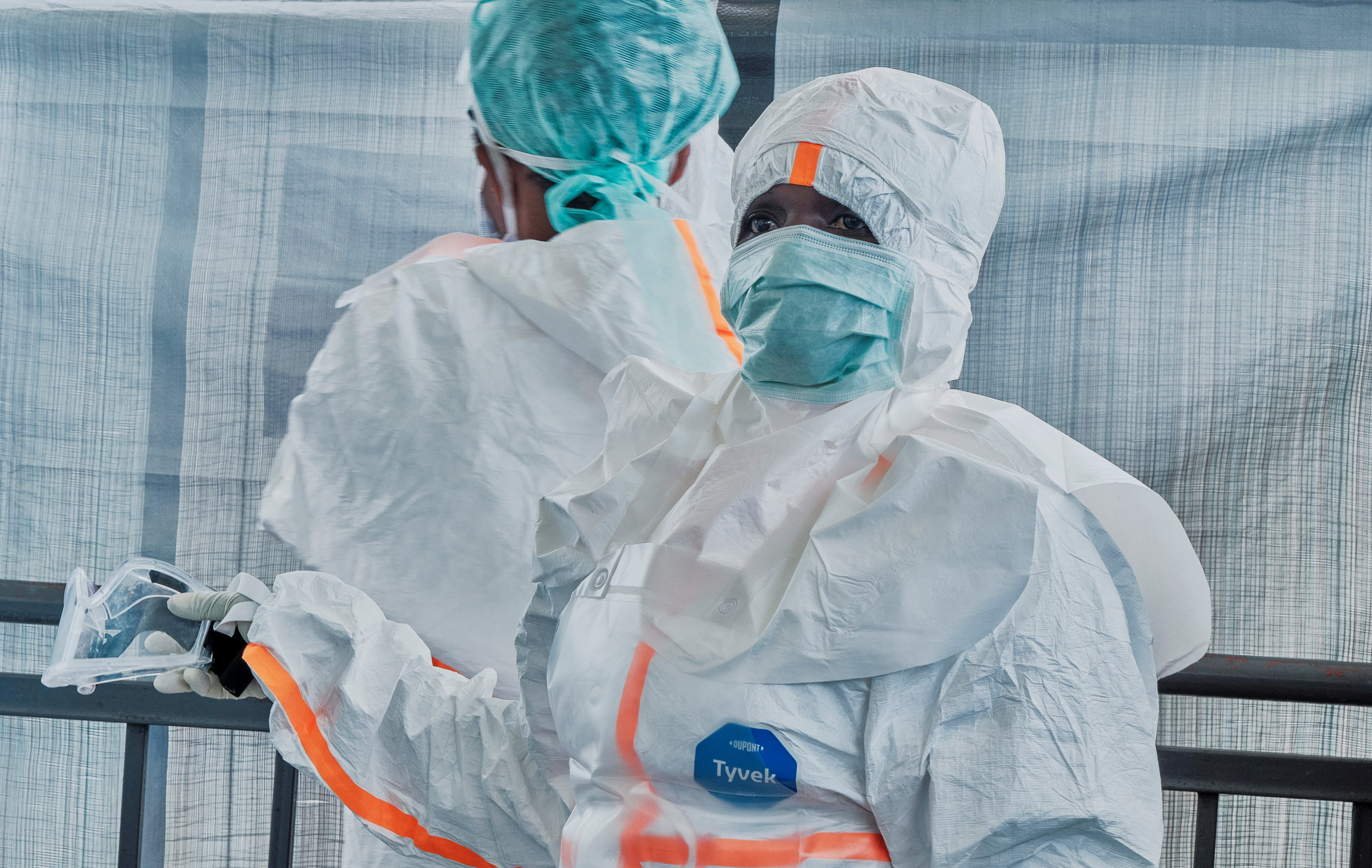 Medical team from the Alliance for International Medical Action (ALIMA), an international NGO dress up in personal protective equipment (PPE) as they set up a treatment centre for the Ebola response, as agencies intensify efforts to contain a new Ebola outbreak caused by the Bundibugyo virus strain, in Rwampara outside Bunia, Ituri province, Democratic Republic of the Congo, May 29, 2026.