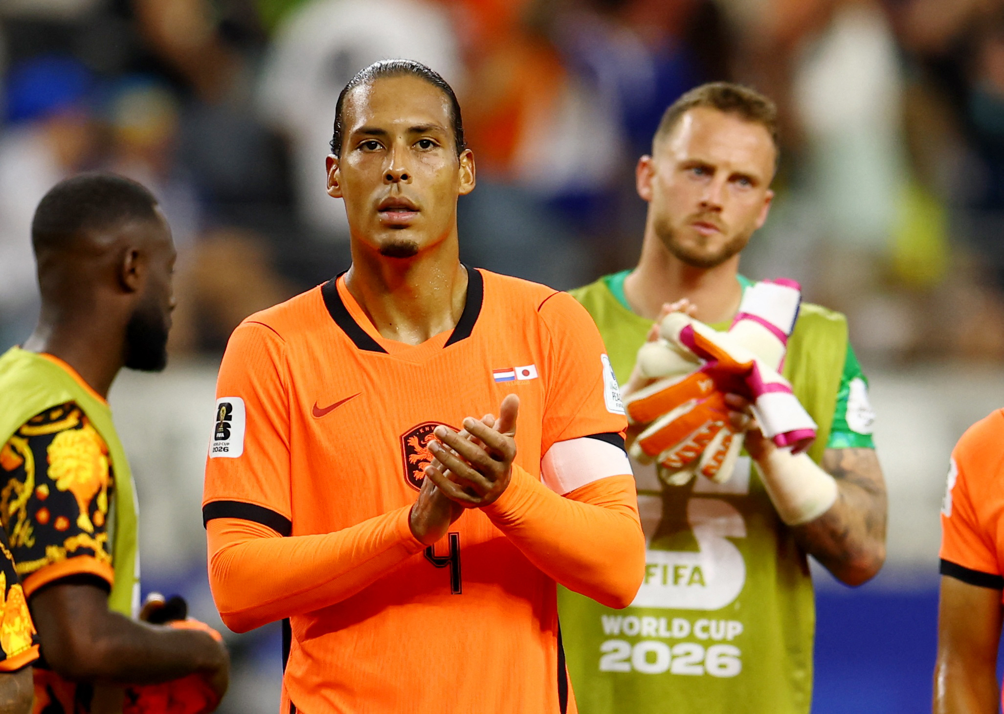 Netherlands' Virgil van Dijk applauds fans after the match