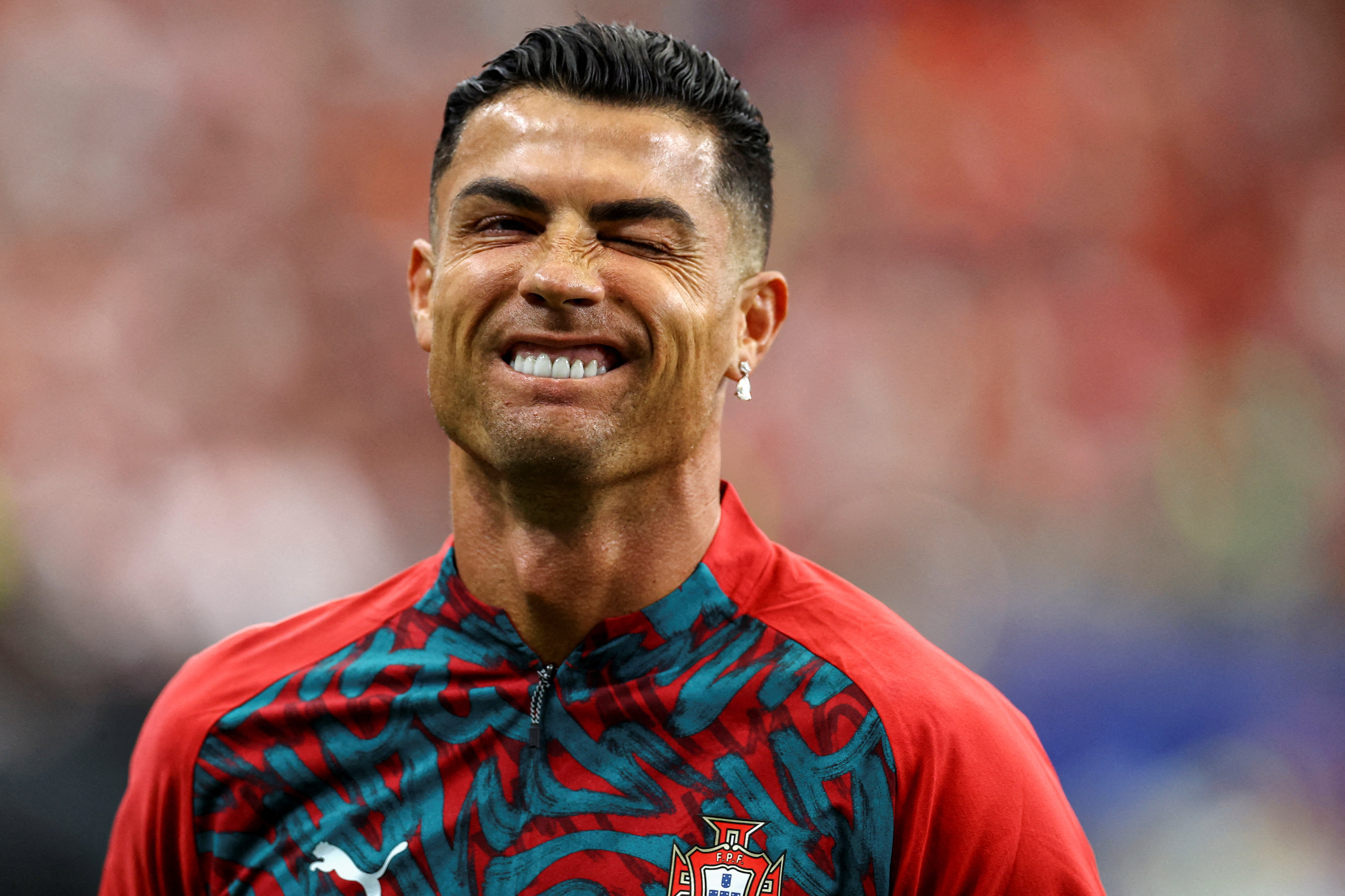 Soccer Football - FIFA World Cup 2026 - Group K - Portugal v DR Congo - Houston Stadium, Houston, Texas, U.S. - June 17, 2026 Portugal's Cristiano Ronaldo winks during the warm up before the match REUTERS/Phil Noble TPX IMAGES OF THE DAY SEARCH "WORLD CUP DAILY ONE" FOR THIS STORY. SEARCH "WIDER IMAGE" FOR ALL STORIES.