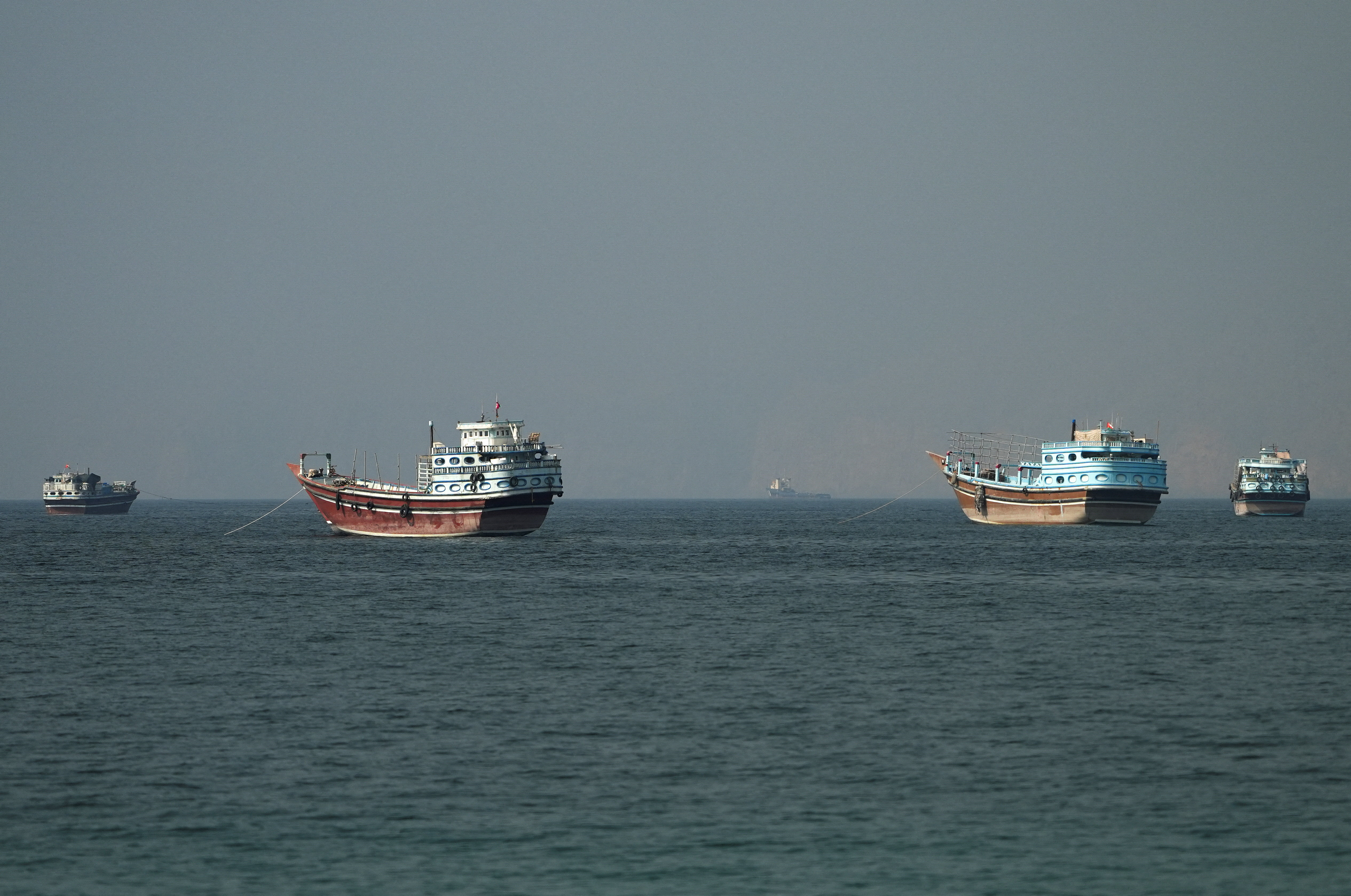 Vessels at the Strait of Hormuz, as seen from Musandam, Oman, June 26, 2026. [File: Stringer/Reuters]