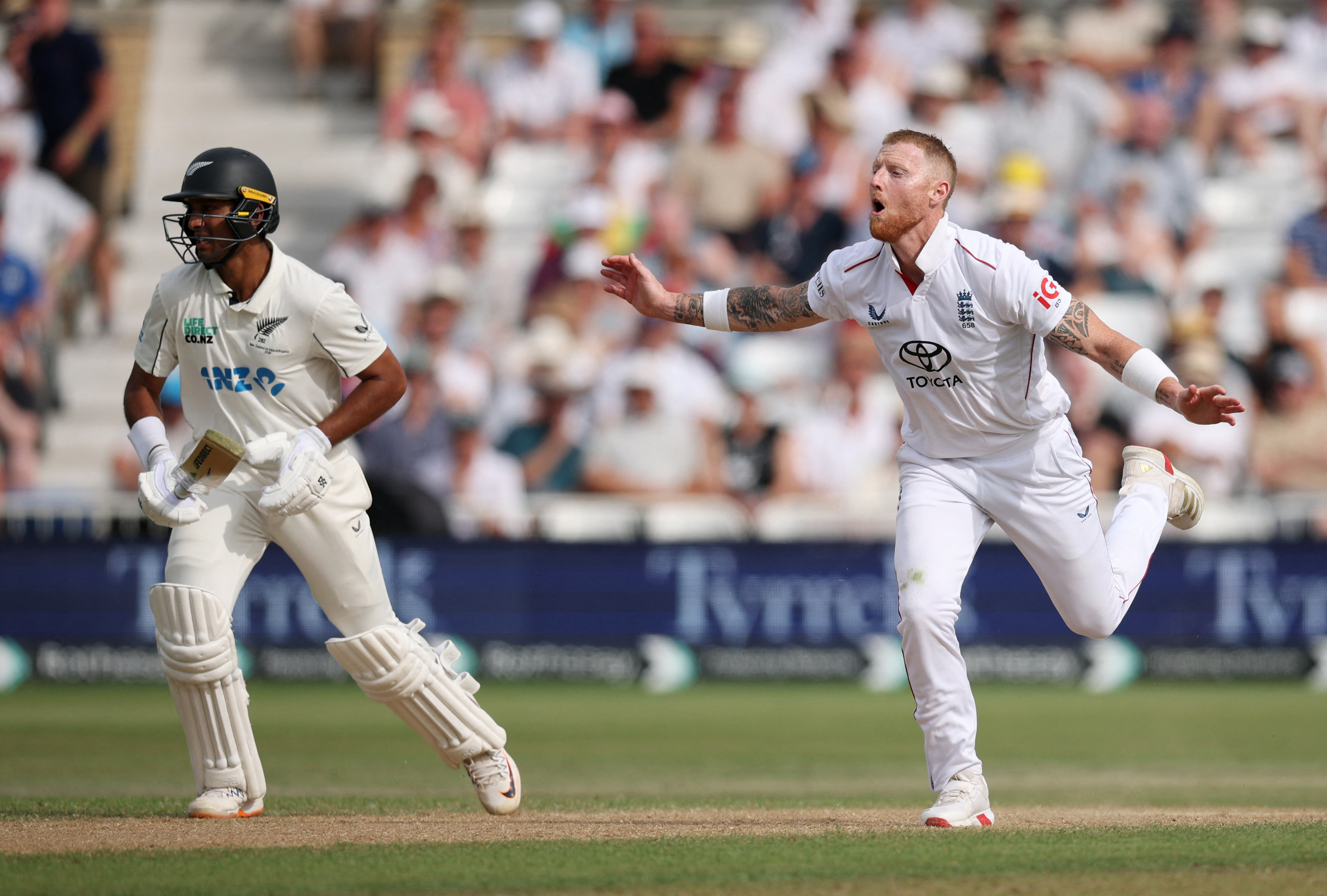 Stokes reacts alongside New Zealand’s Rachin Ravindra