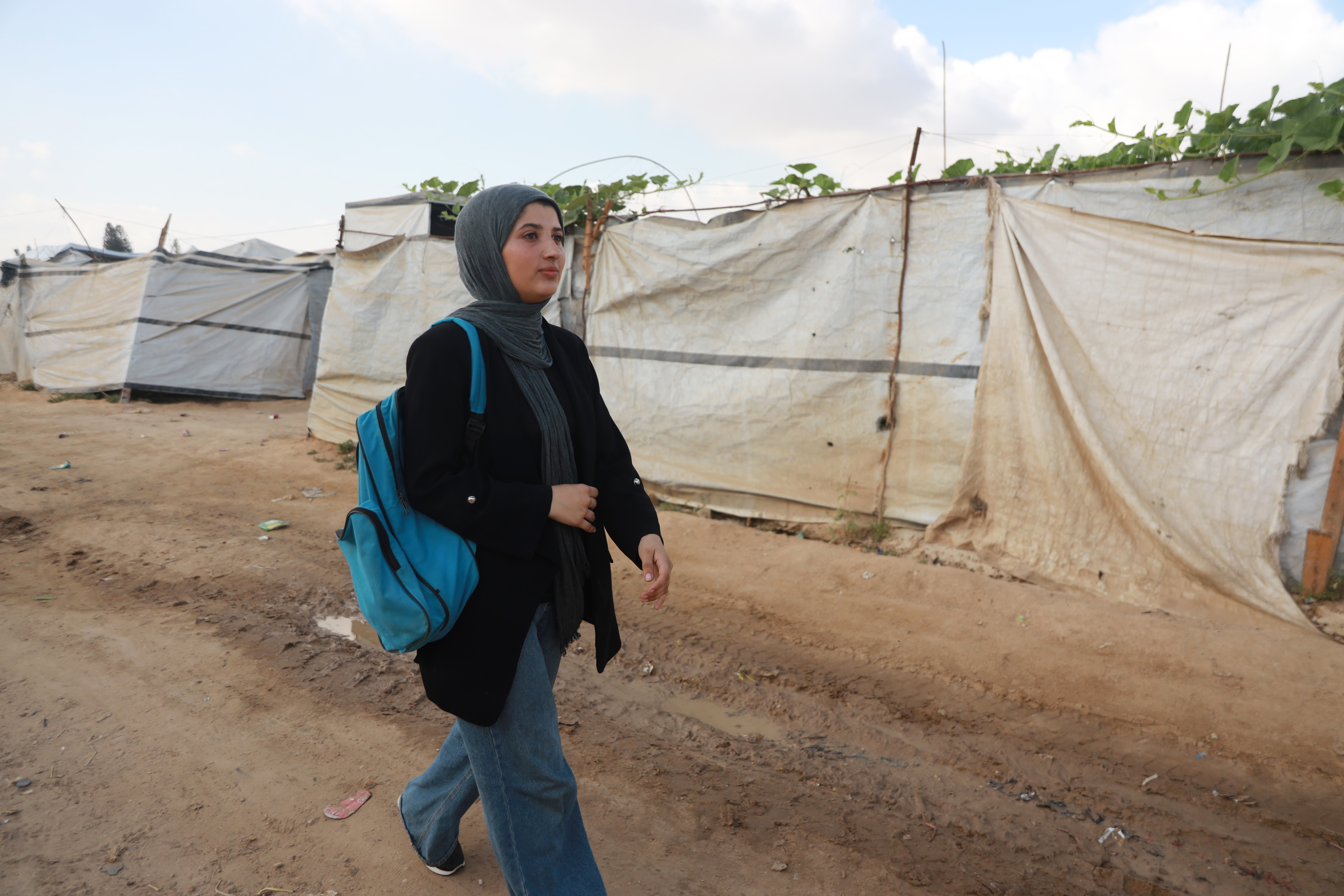 Dana walks to a cafe equipped with electricity and internet so that she can take her exam