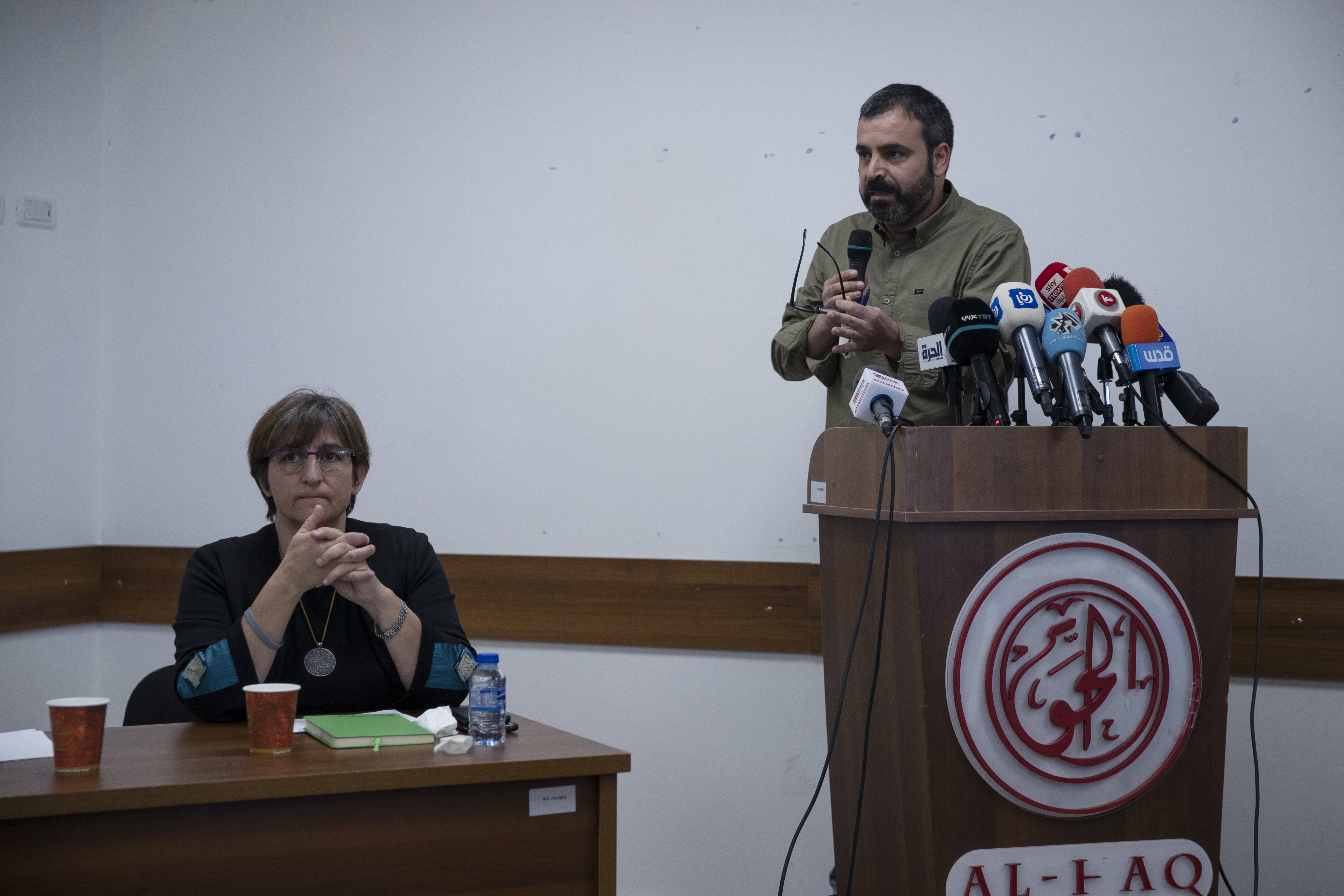 Tahseen Elayyan, from Al-Haq, speaks at a joint news conference in Ramallah, on Monday, November 8, 2021, after security researchers said spyware from the Israeli company NSO Group was detected on the cellphones of six Palestinian human rights activists