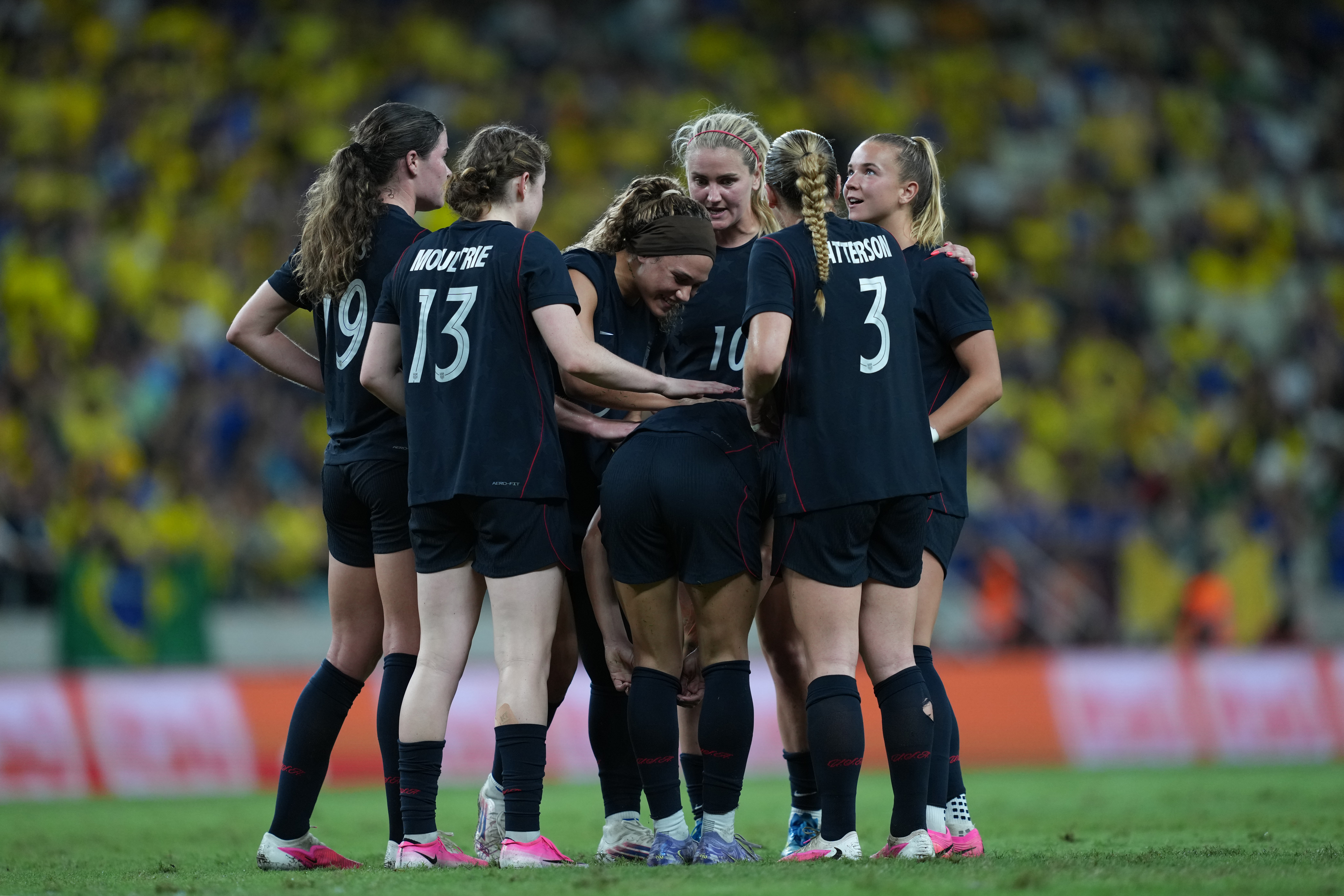 Sophia Smith celebrates with teammates after the opening goal during the international friendly match between Brazil and the US