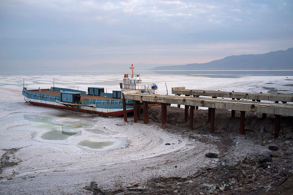 URMIA, IRAN - OCTOBER 11, 2014: A genral view of the Urmia Lake which has ran out of water due to ecological catastrophe on October 11, 2014 in Urmia, Iran. Lake Urmia is a salt lake in northwestern Iran near Iran's border with Turkey. The lake is between the provinces of East Azerbaijan and West Azerbaijan in Iran, and west of the southern portion of the Caspian Sea. At its full size, it is the largest lake in the Middle East and the sixth largest saltwater lake on earth with a surface area of approximately 5,200 kmÂ² (2,000 mileÂ²), 140 km (87 mi) length, 55 km (34 mi) width, and 16 m (52 ft) depth. Lake Urmia along with its approximately 102 islands are protected as a national park by the Iranian Department of Environment. (Photo by Kaveh Kazemi/Getty Images)