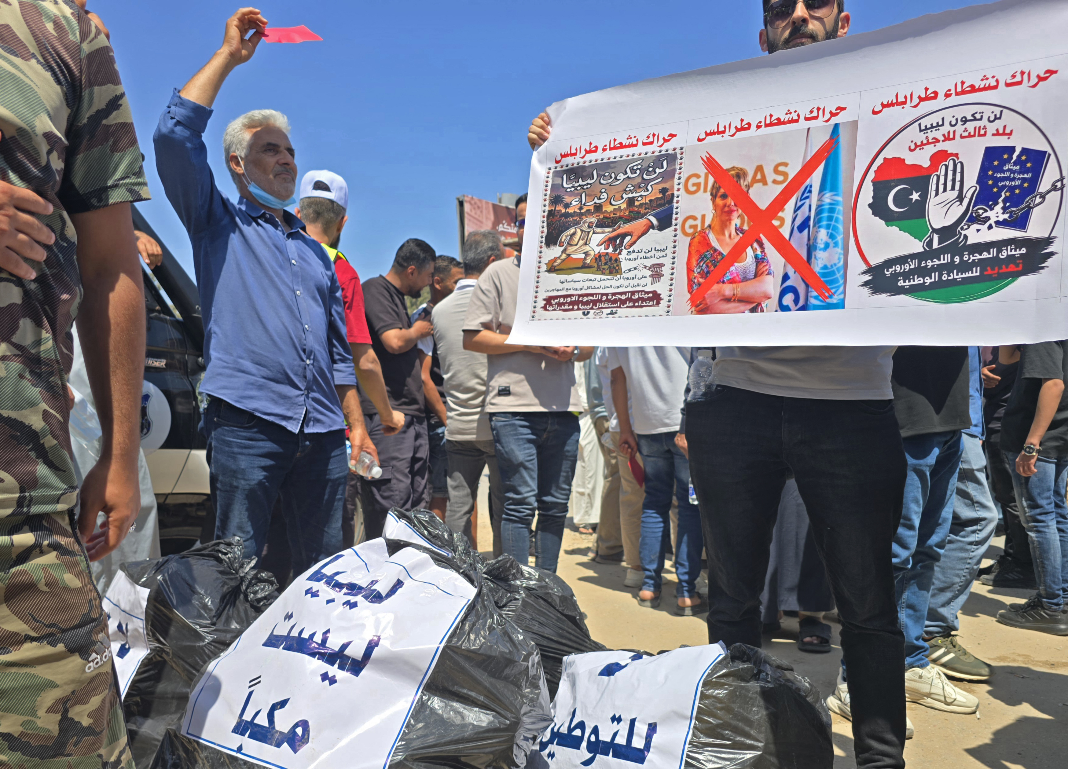 Libyans take part in a demonstration in front of the UNHCR office in Tripoli on June 4, 2026, demanding the departure and closure of the UNHCR offices and declaring 'No to foreign settlement in Libya'.