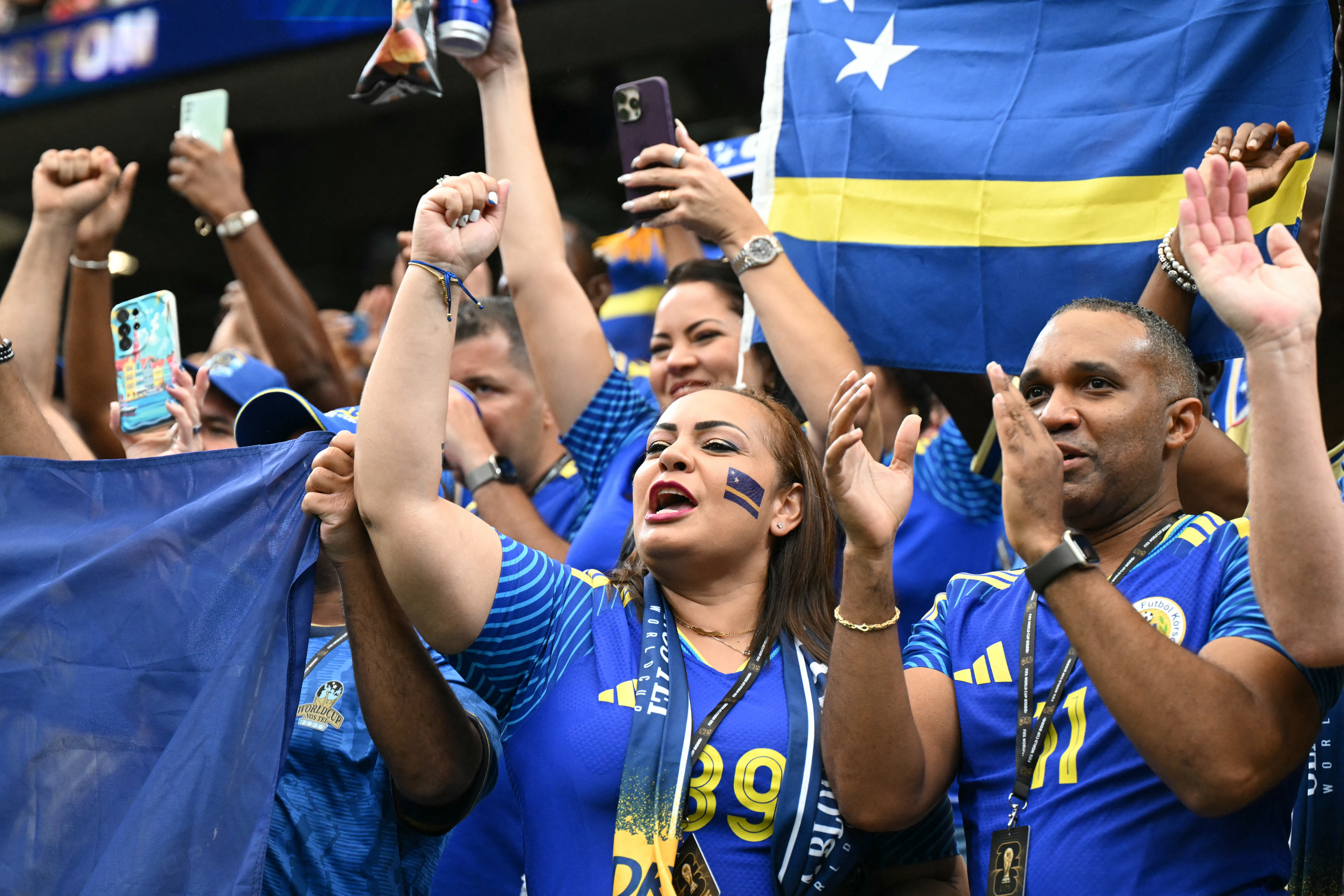 Curacao supporters react after the 2026 World Cup Group E football match between Germany and Curacao at the Houston Stadium in Houston on June 14, 2026.