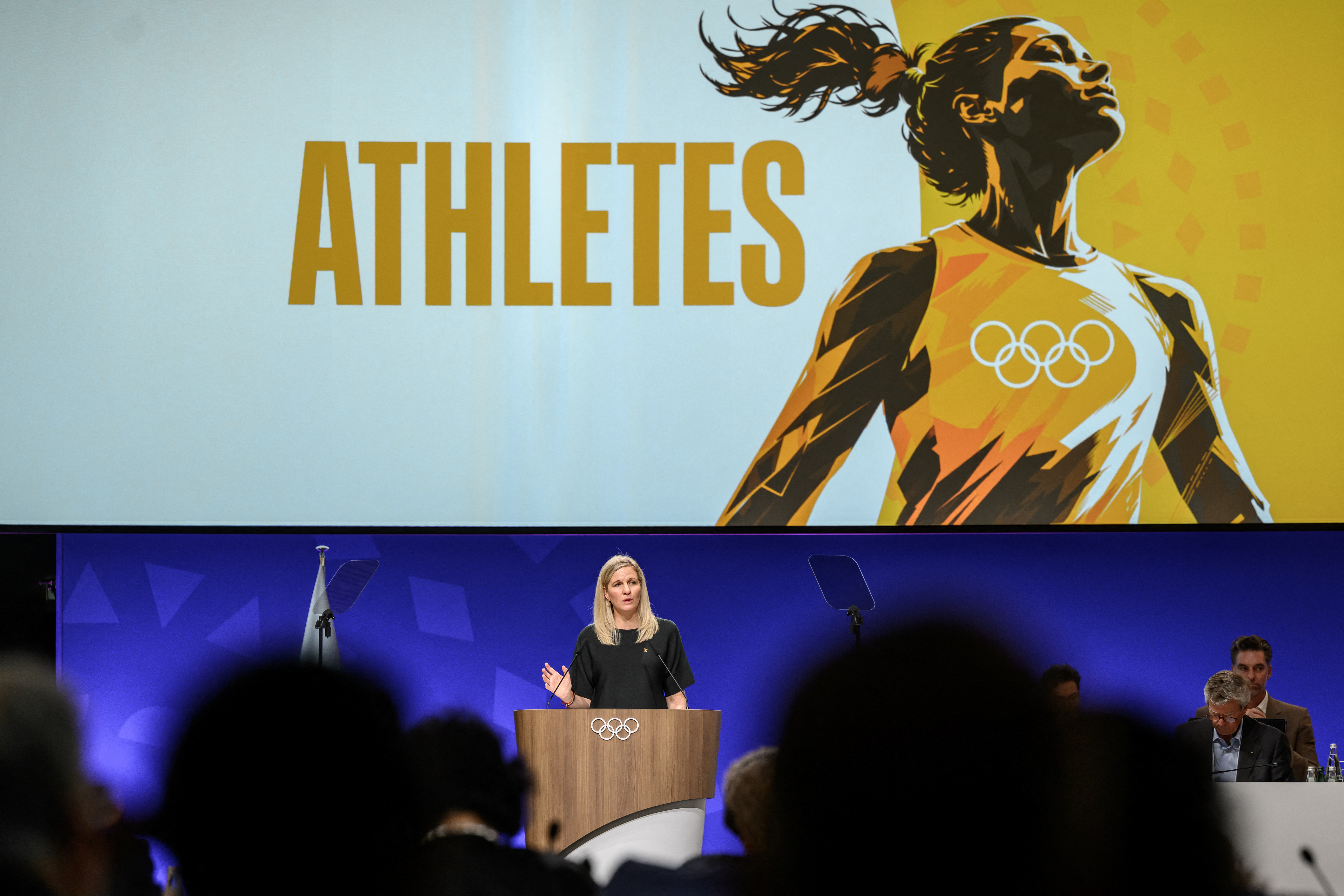International Olympic Committee president (IOC) Kirsty Coventry delivers her speech at the opening of an IOC session, in Lausanne, on June 24, 2026 [AFP]