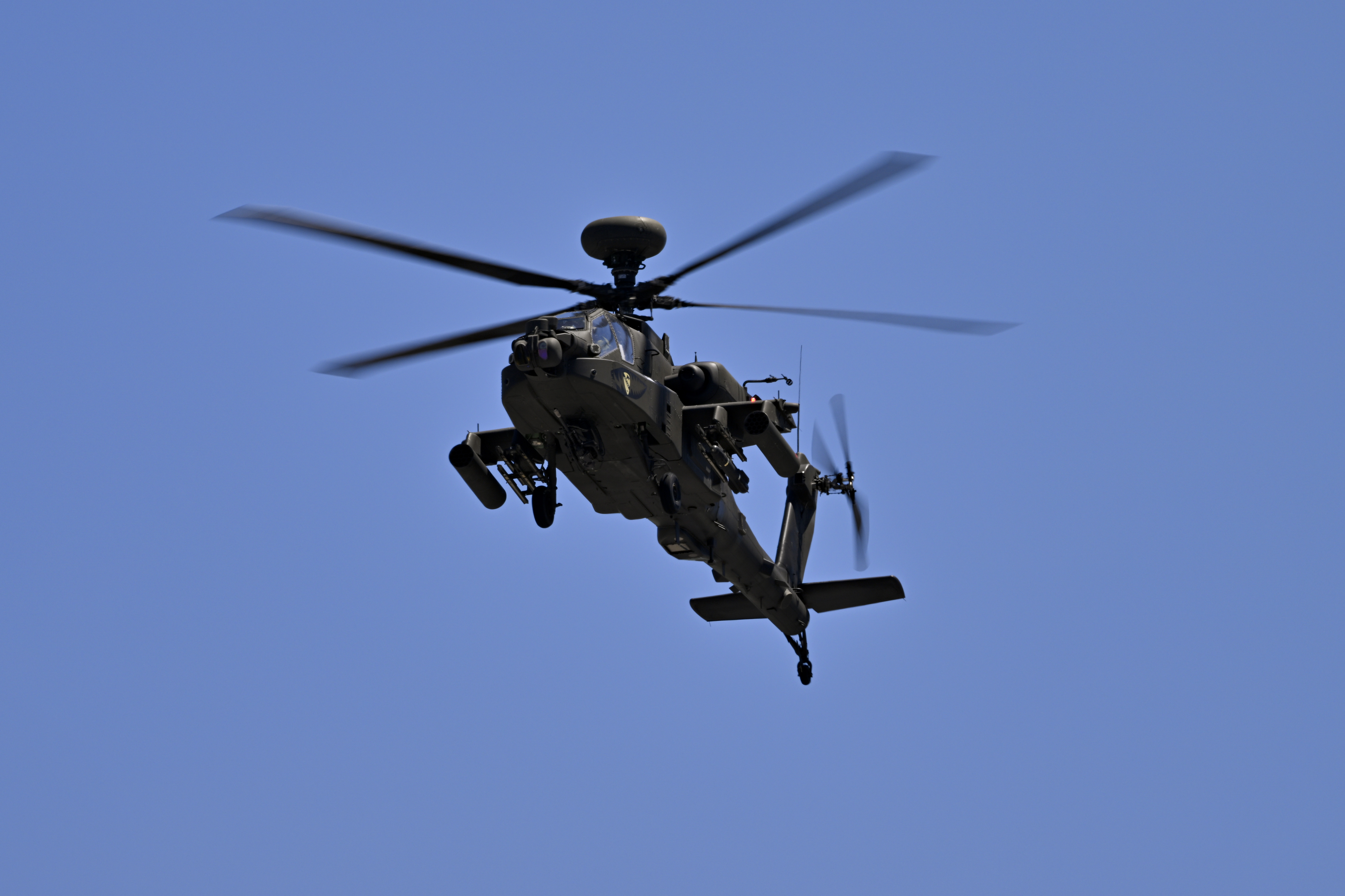 May 3, 2025; Fort Worth, Texas, USA; A view a US Army apache helicopter during a flyover before the start of the NASCAR Xfinity race at Texas Motor Speedway. Mandatory Credit: Jerome Miron-Imagn Images
