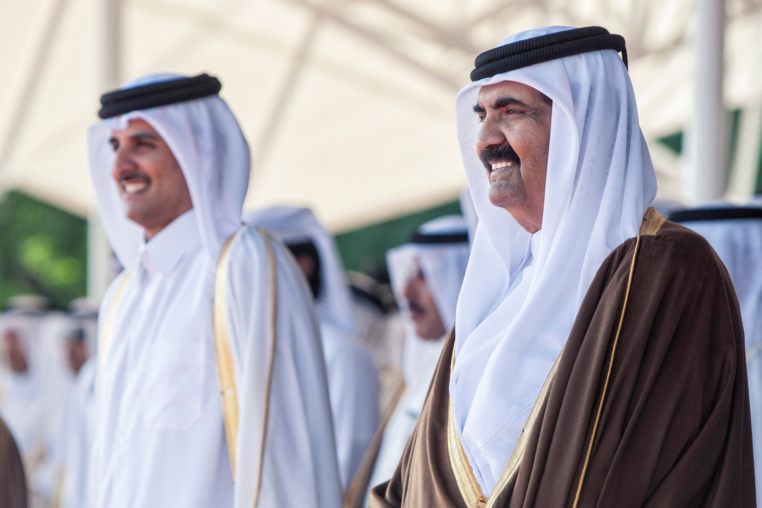 Sheikh Hamad, right, with his son Sheikh Tamim bin Hamad Al Thani