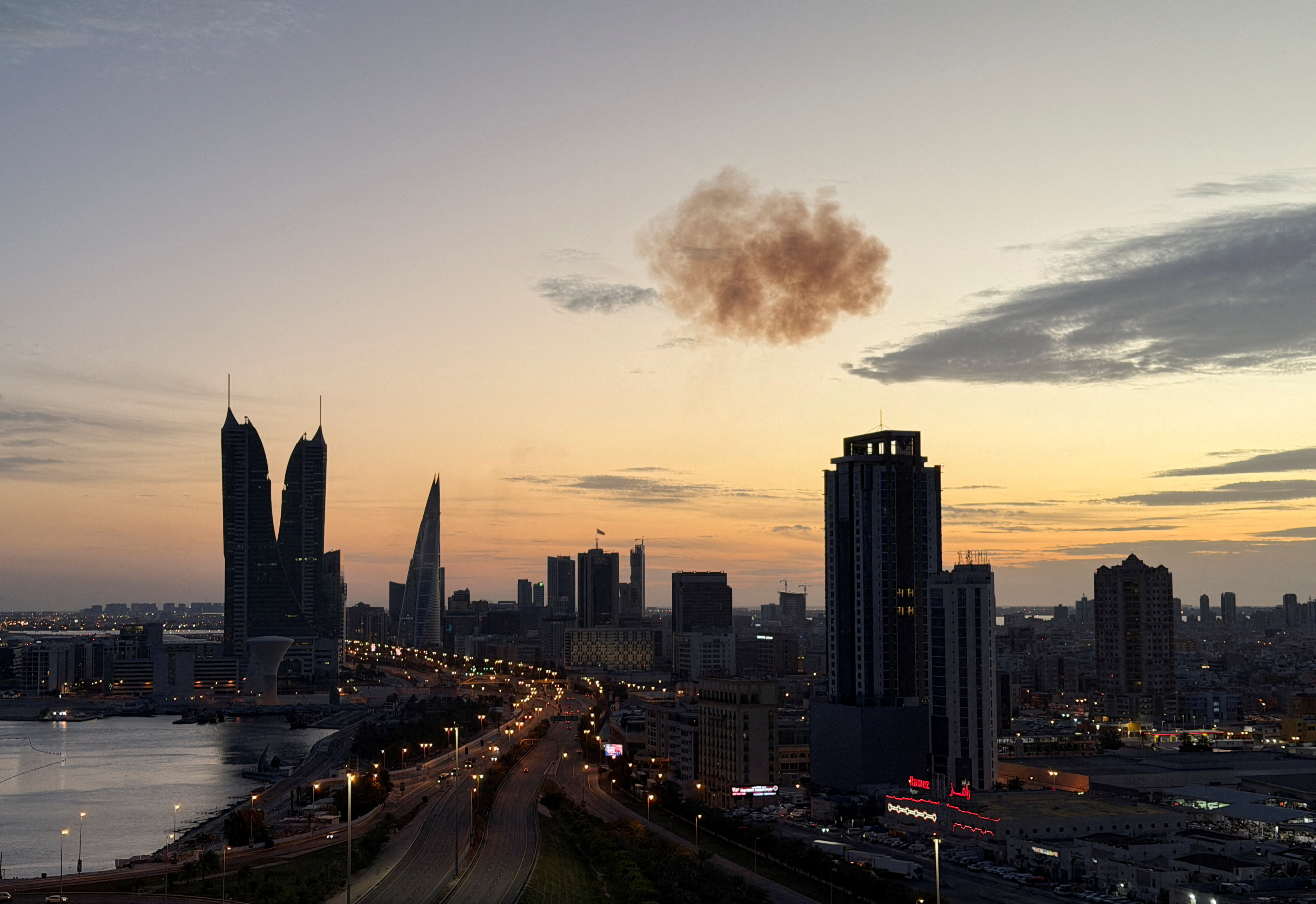 Smoke rises after an Iranian drone was intercepted over the Bahrain Financial Harbour towers, which houses the Israeli embassy, amid the U.S.-Israeli conflict with Iran, in Manama, Bahrain, March 6, 2026.