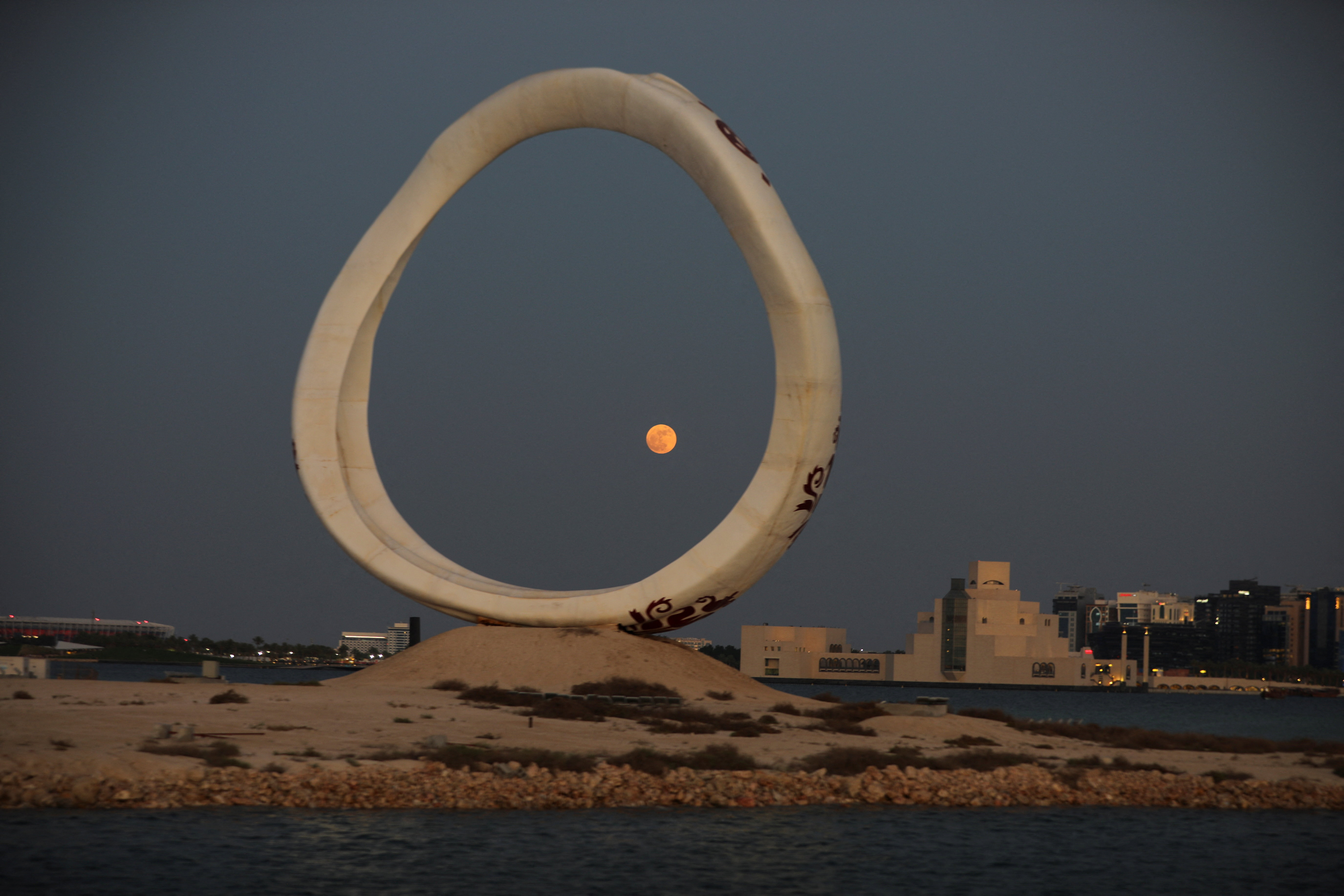 The moon rises over Doha, Qatar, June 29, 2026. [File: Bassam Masoud/Reuters]