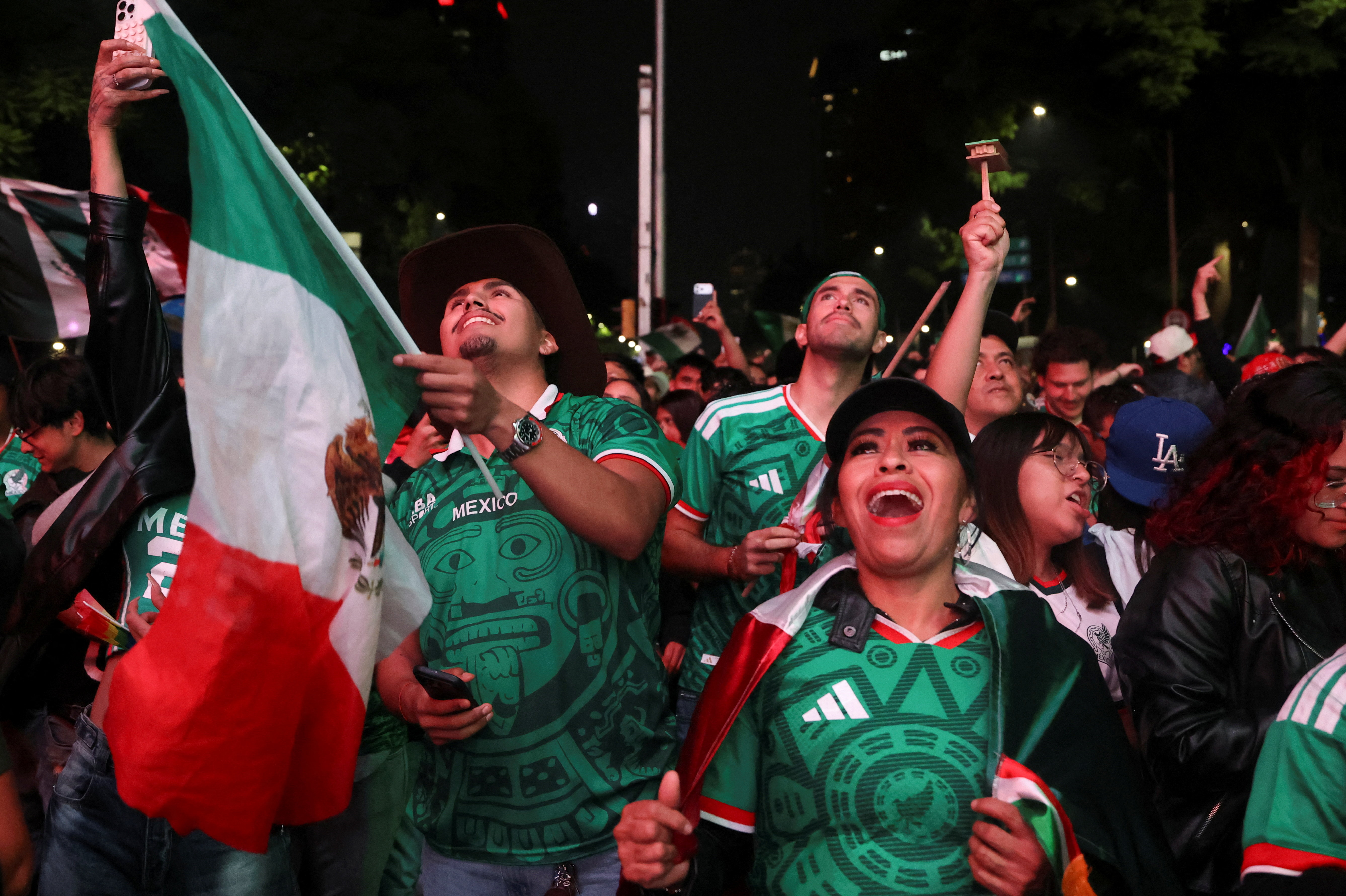 Mexico fans celebrate their team’s accomplishment of breaking a 40-year curse with a World Cup knockout win