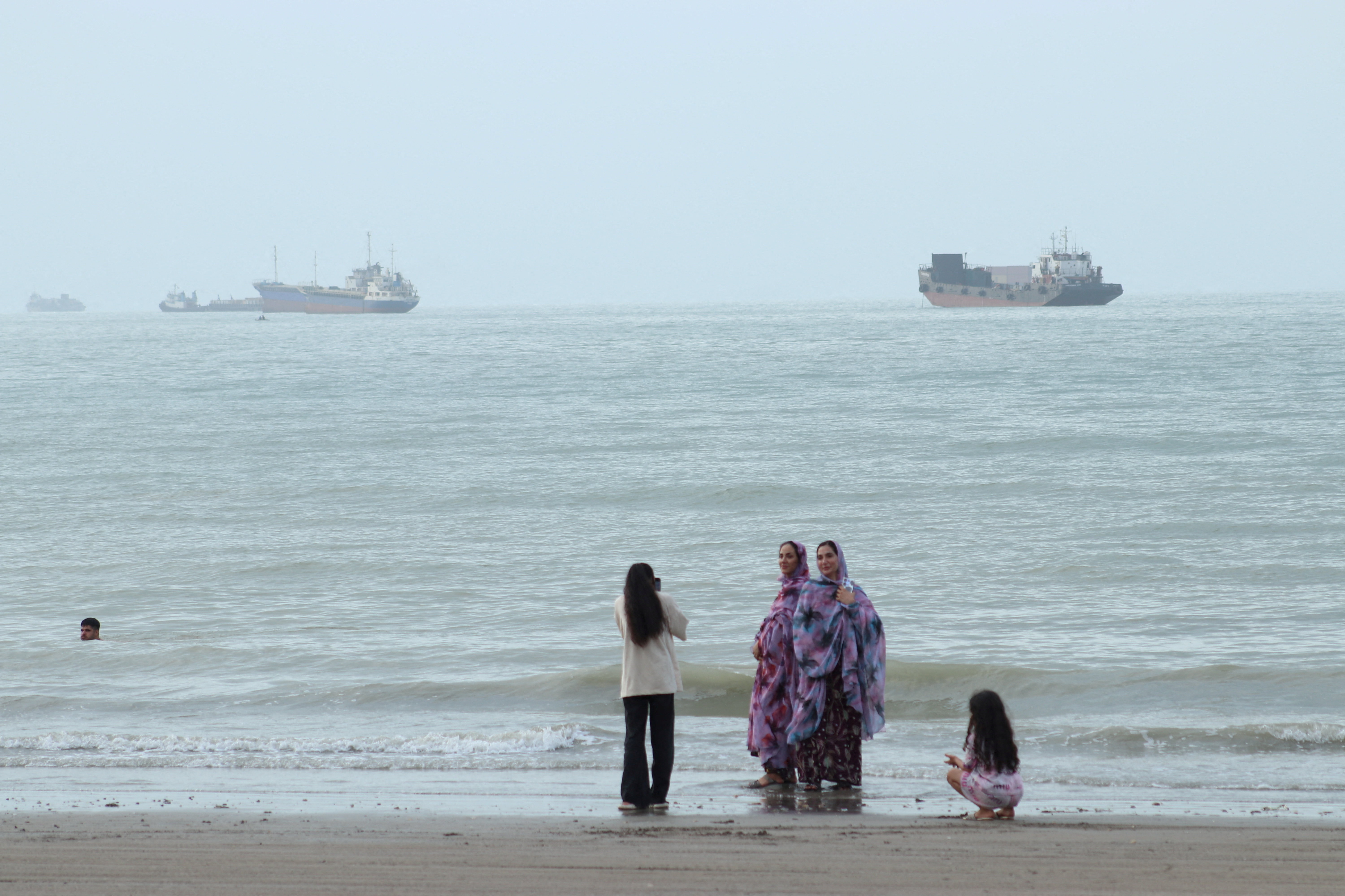 Vessels in the Strait of Hormuz near the beach of Bandar Abbas, Iran, July 27, 2026.