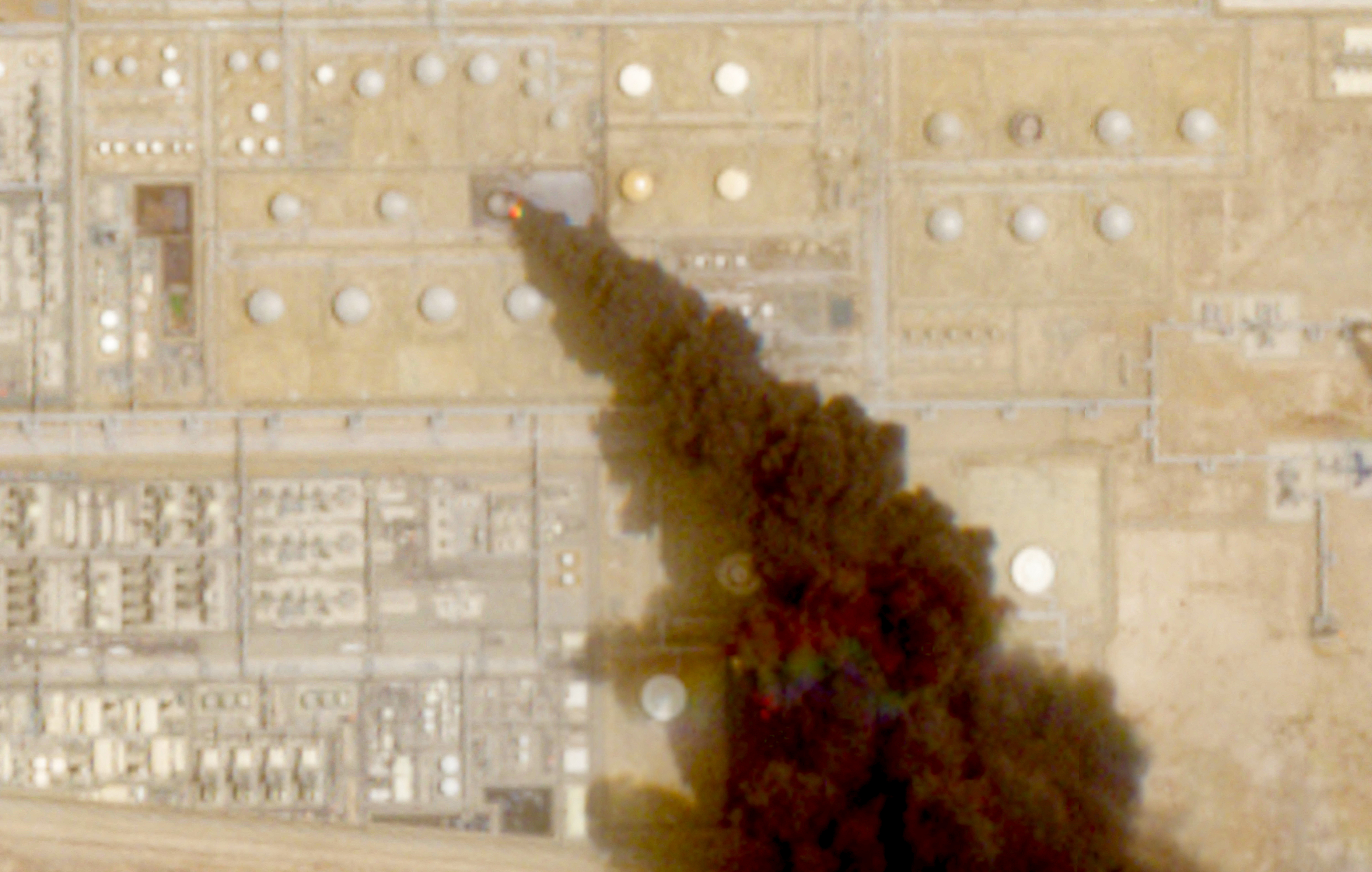 A satellite image shows trail of smoke rising from an oil facility, in Jizan, Jazan province, Saudi Arabia, July 26, 2026. Yemen's Iran-aligned Houthis said on Saturday, July 25, that they carried out operations targeting Saudi Aramco facilities in Jizan and Yanbu, according to a statement by the group's military spokesperson Yahya Sare. European Union/Copernicus Sentinel-2/Handout via REUTERS THIS IMAGE HAS BEEN SUPPLIED BY A THIRD PARTY. MANDATORY CREDIT