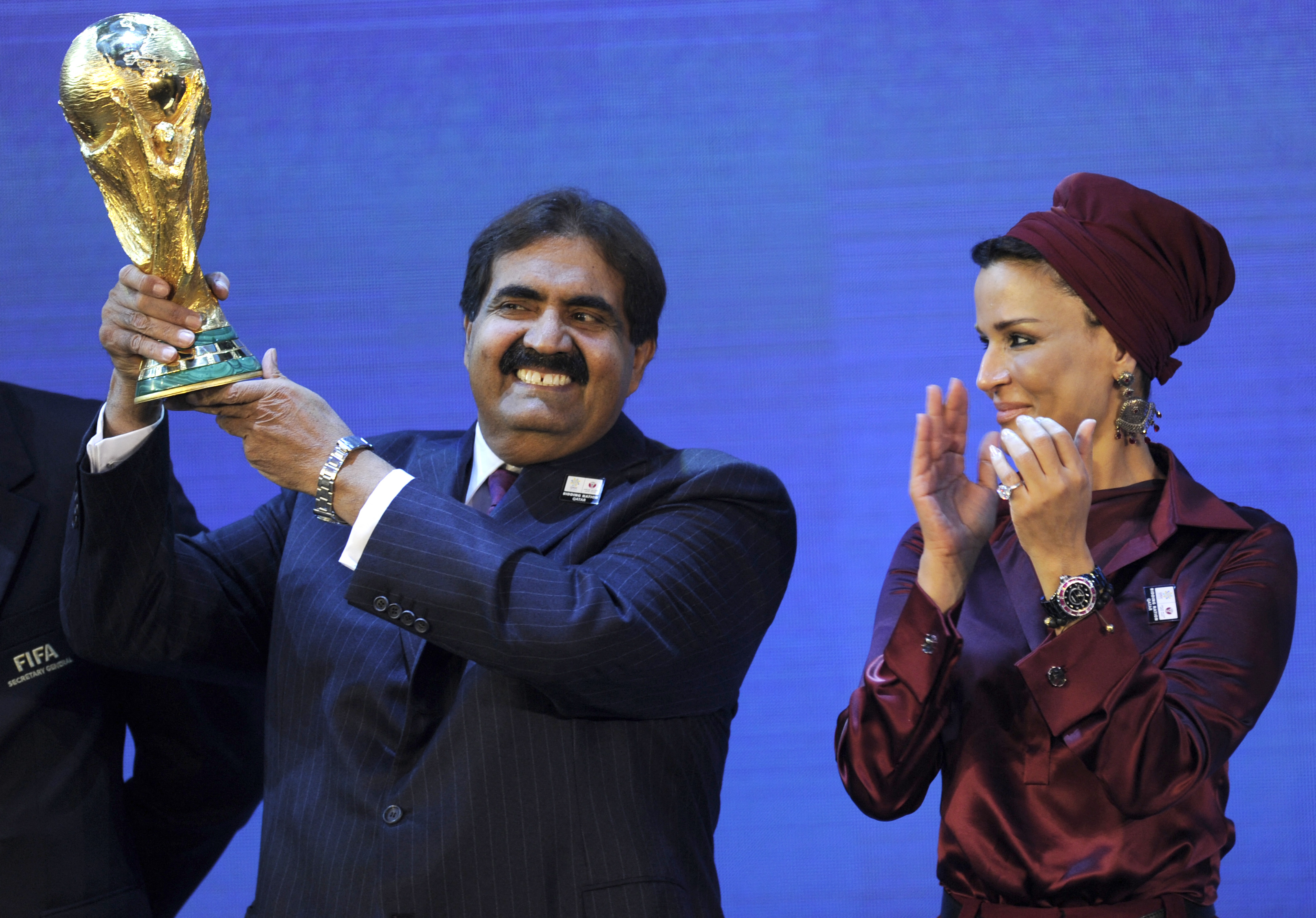 Emir Sheikh Hamad and his wife Sheikha Moza bint Nasser with the World Cup trophy after the announcement that Qatar will host the 2022 edition at the FIFA headquarters in Zurich, Switzerland on December 2, 2010