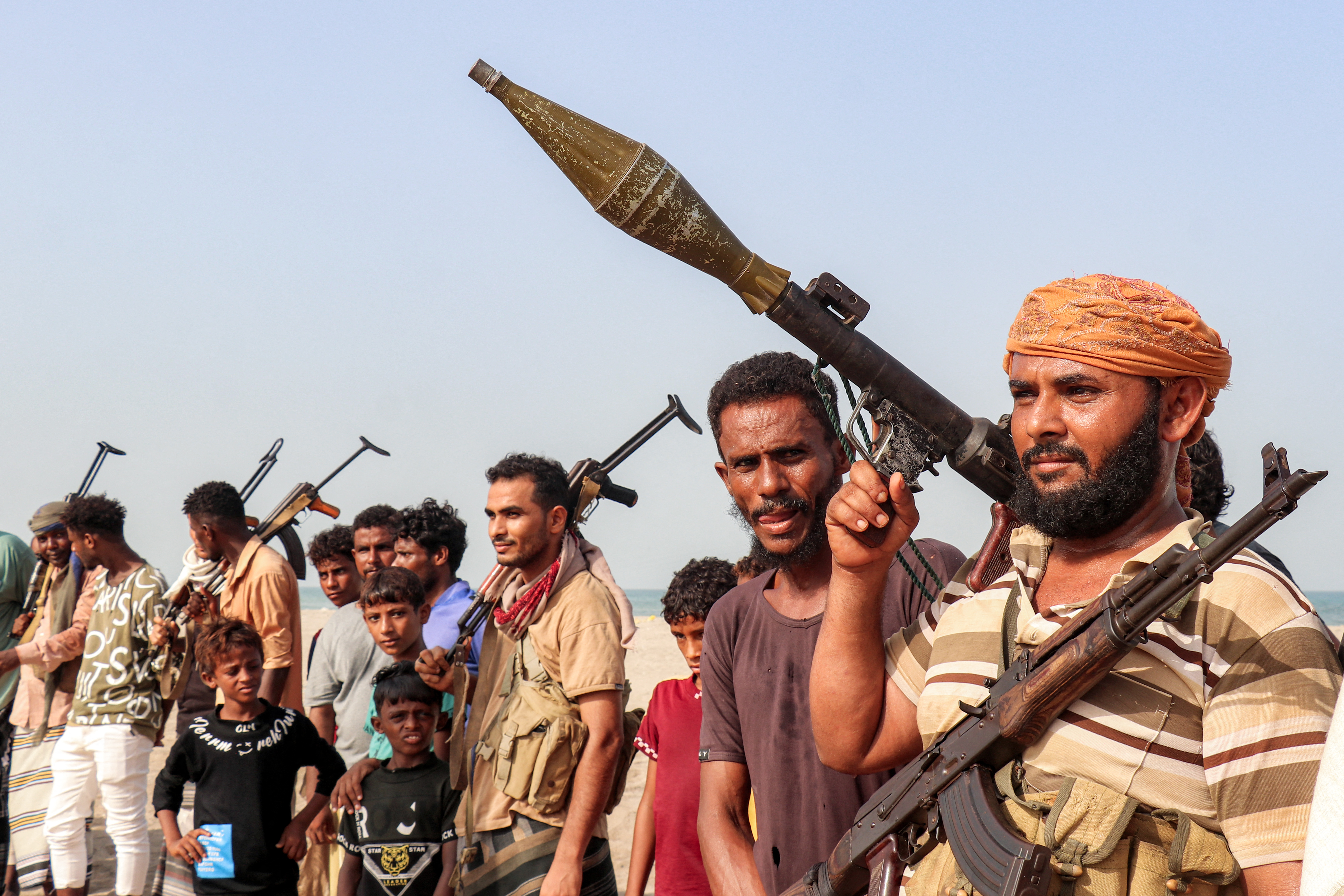 Fighters supporting the Aden-based internationally recognised Yemeni government gather during a vigil along the Red Sea shore in Khokha, in Yemen’s western Hodeidah province, on July 20, 2026. They called for a resumption of hostilities with the Houthi group currently controlling the capital, Sanaa [AFP]