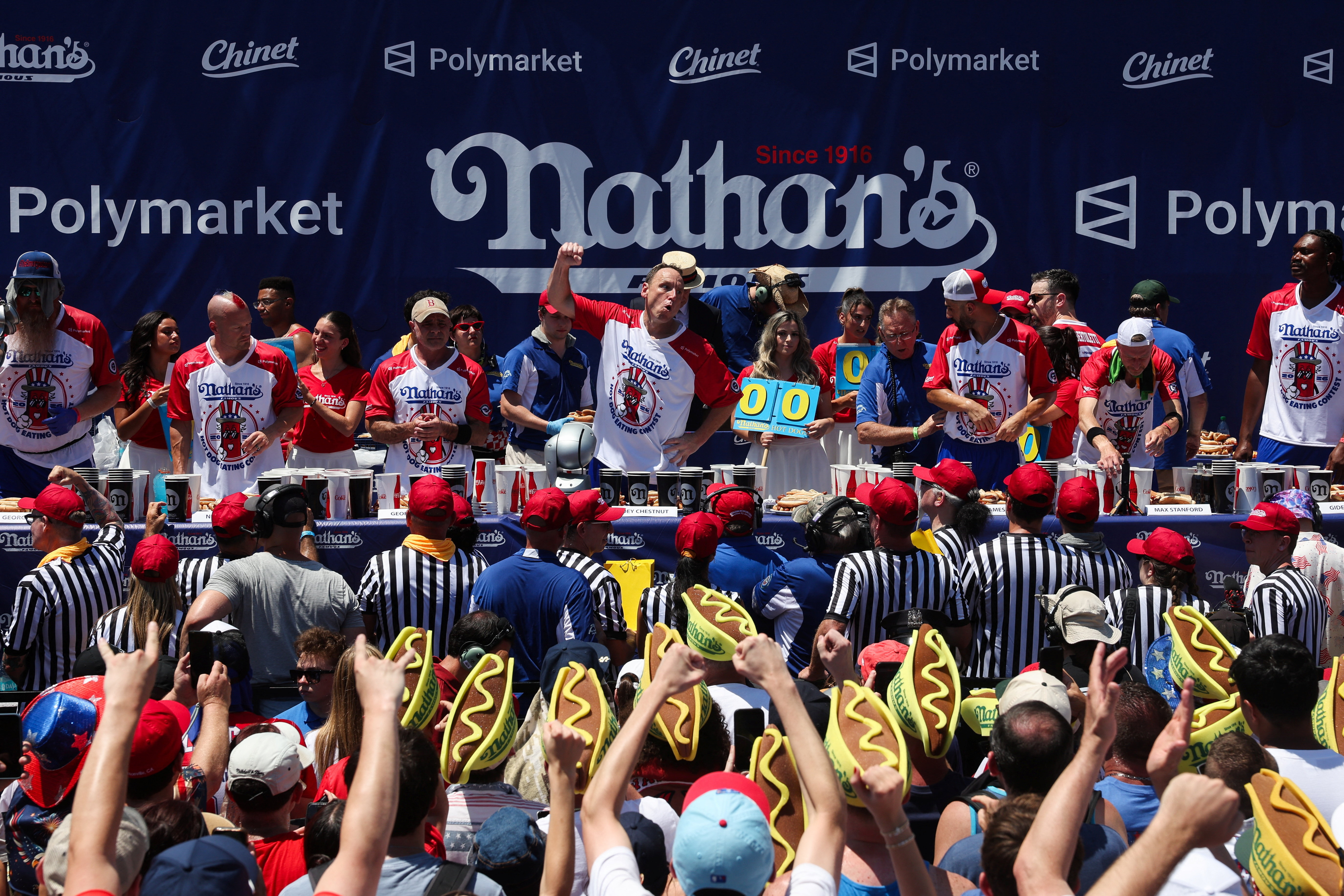 Joey Chestnut gestures as he participates in the 2026 Nathan's Famous International Hot Dog Eating Contest, at Coney Island, Brooklyn in New York City, U.S., July 4, 2026. REUTERS/Jordan Tovin