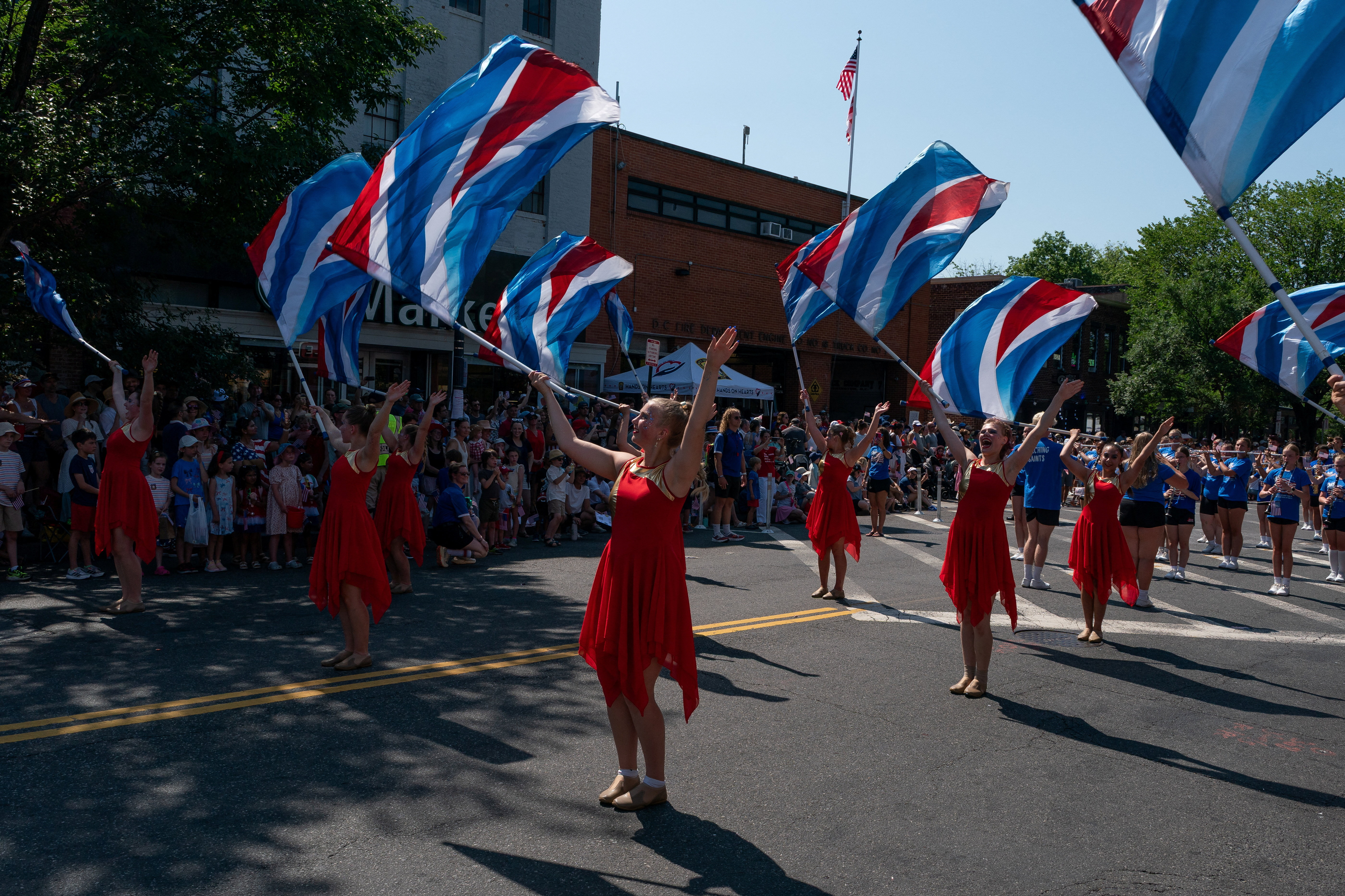 The Kerkhoven-Murdock-Sunburg Marching Saints, of Kerkhoven, Minnesota, participate in the Capitol Hill Community 4th of July Parade marking the 250th anniversary of U.S. Independence, after traveling to Washington for the America's Independence Day Parade which was canceled due to extreme heat, in Washington, D.C., U.S., July 4, 2026. REUTERS/Elizabeth Frantz