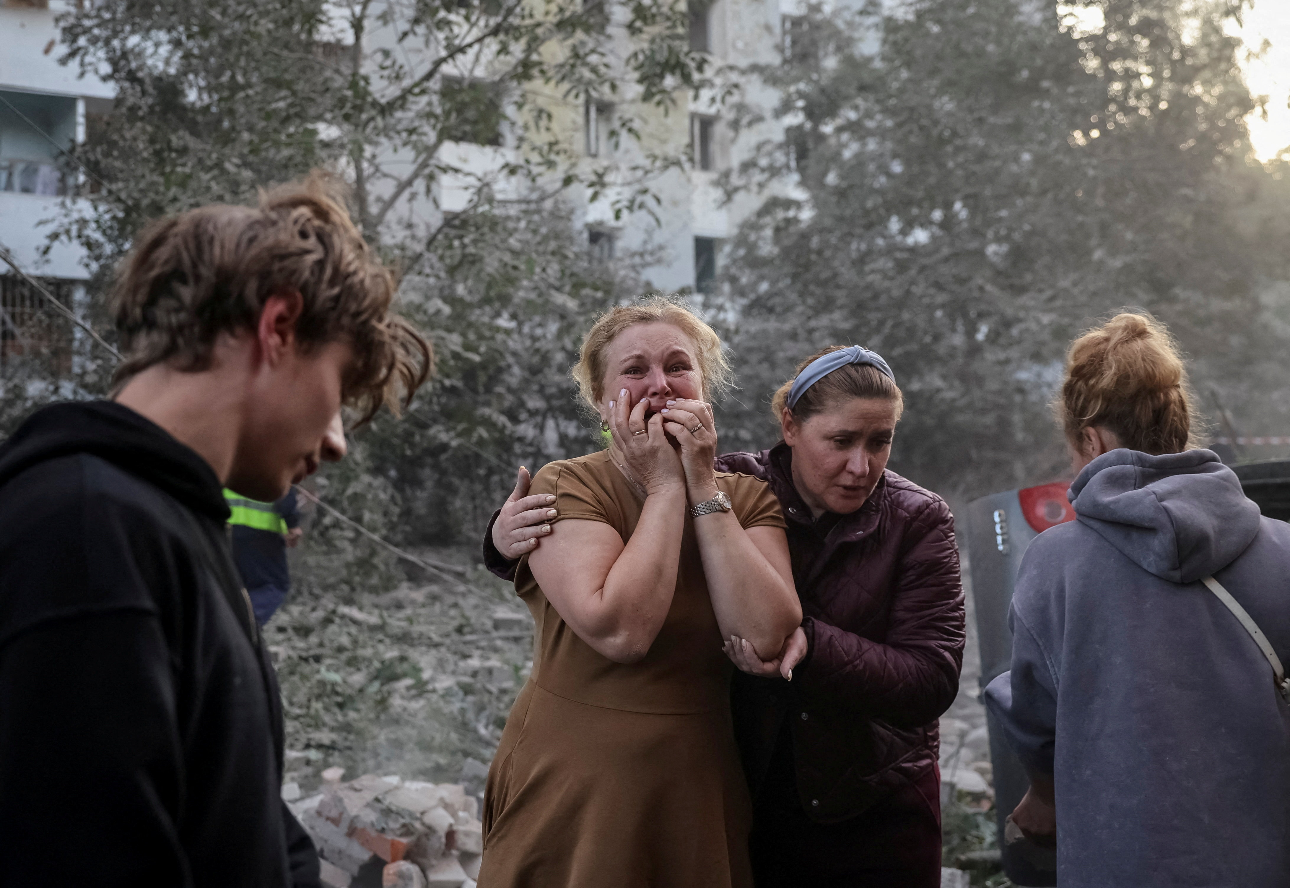 A woman reacts near an apartment building hit by a Russian missile strike, amid Russia's attack on Ukraine, in Lviv, Ukraine July 30, 2026. REUTERS/Roman Baluk TPX IMAGES OF THE DAY