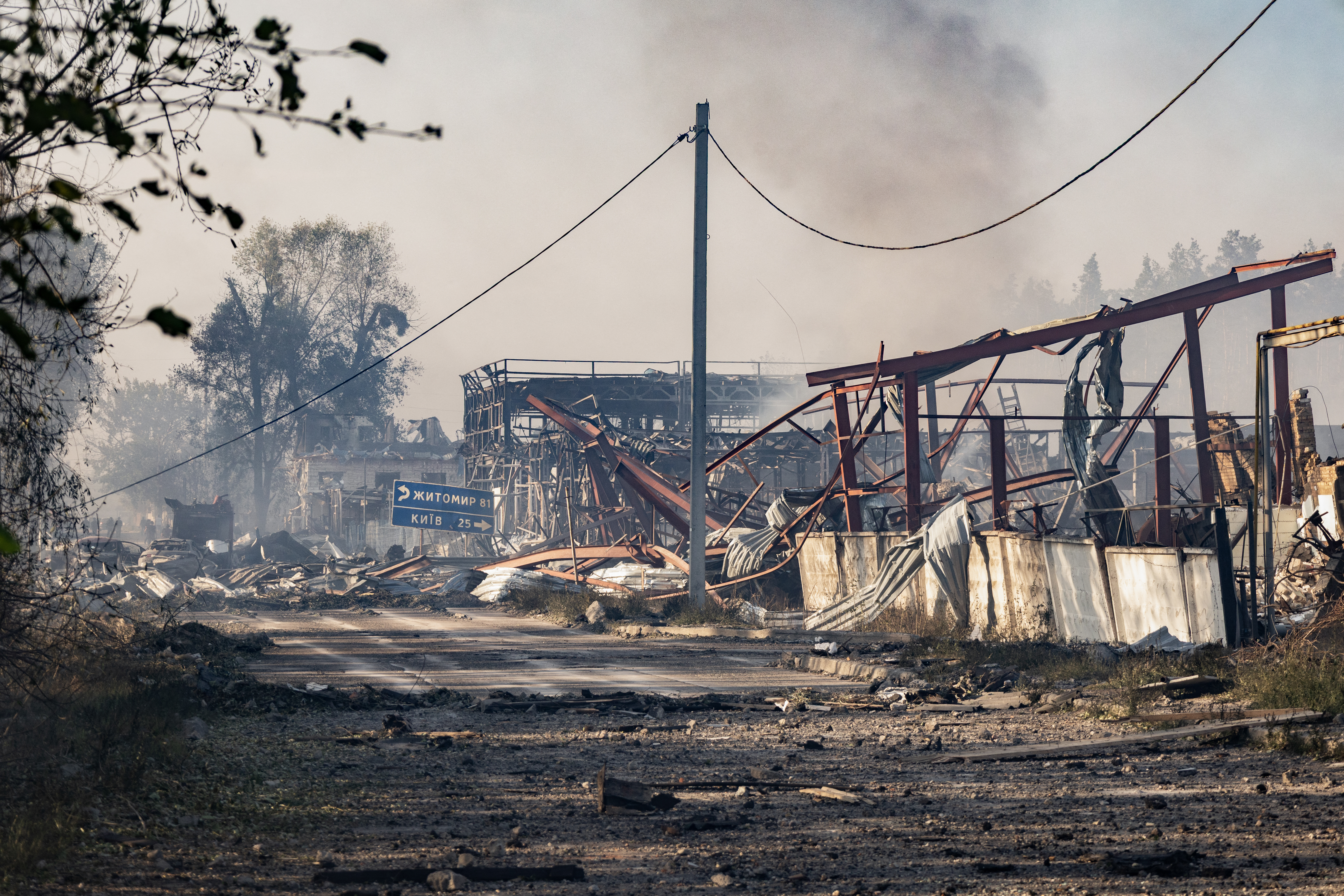 Smoke rises from damaged buildings at the site of a Russian air attack in the Kyiv region on August 29, 2026
